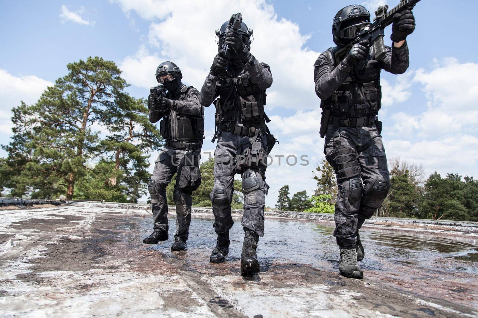 Spec ops police officers SWAT in action in the water