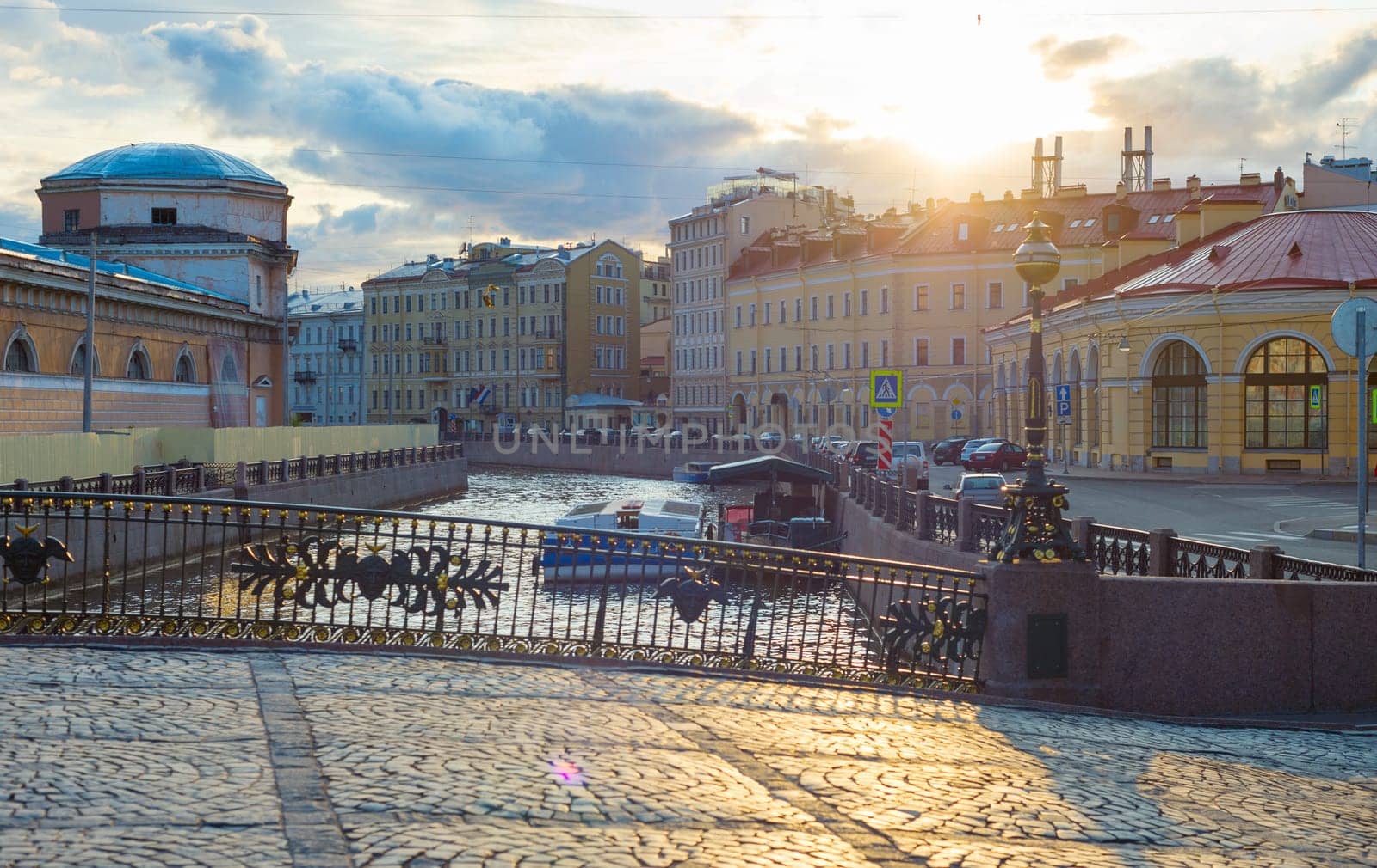 View of Saint-Petersburg pavement street in Old Town at sunset. Russia