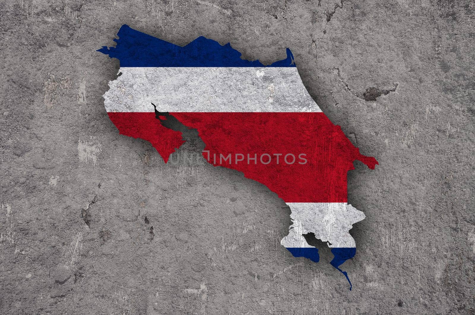 Map and flag of Costa Rica on weathered concrete