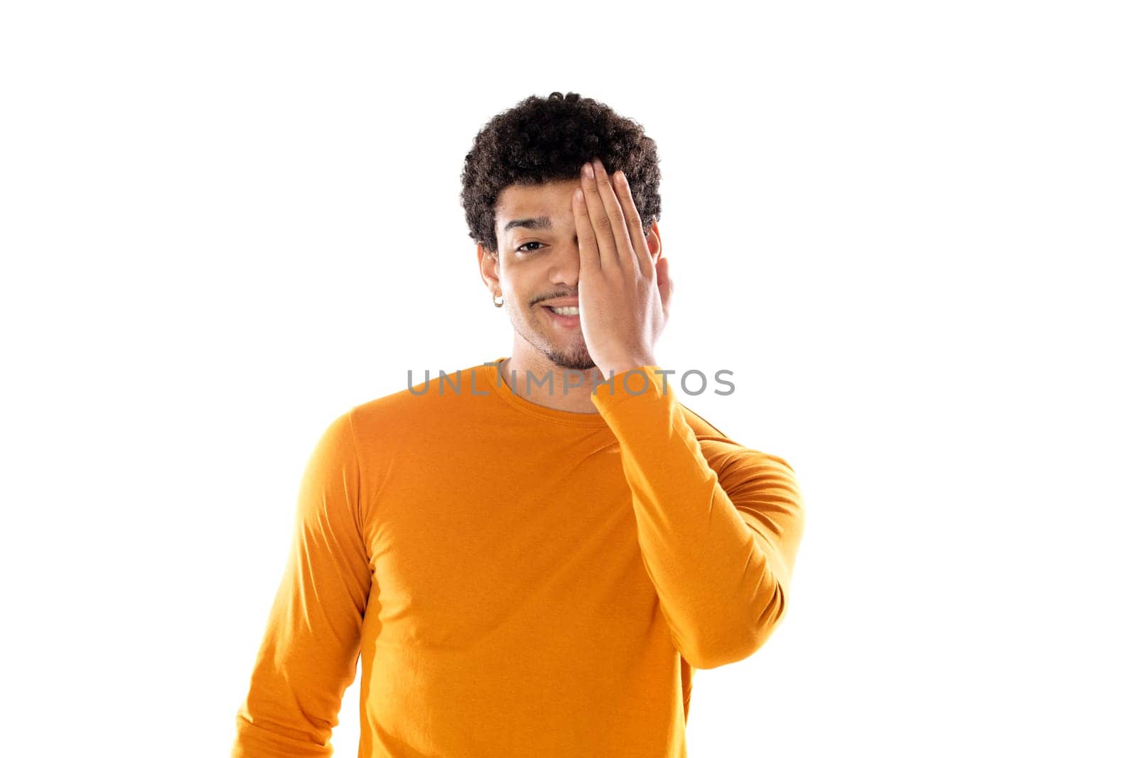 Smiling young man with afro hair wearing orange sweater isolated on a white background