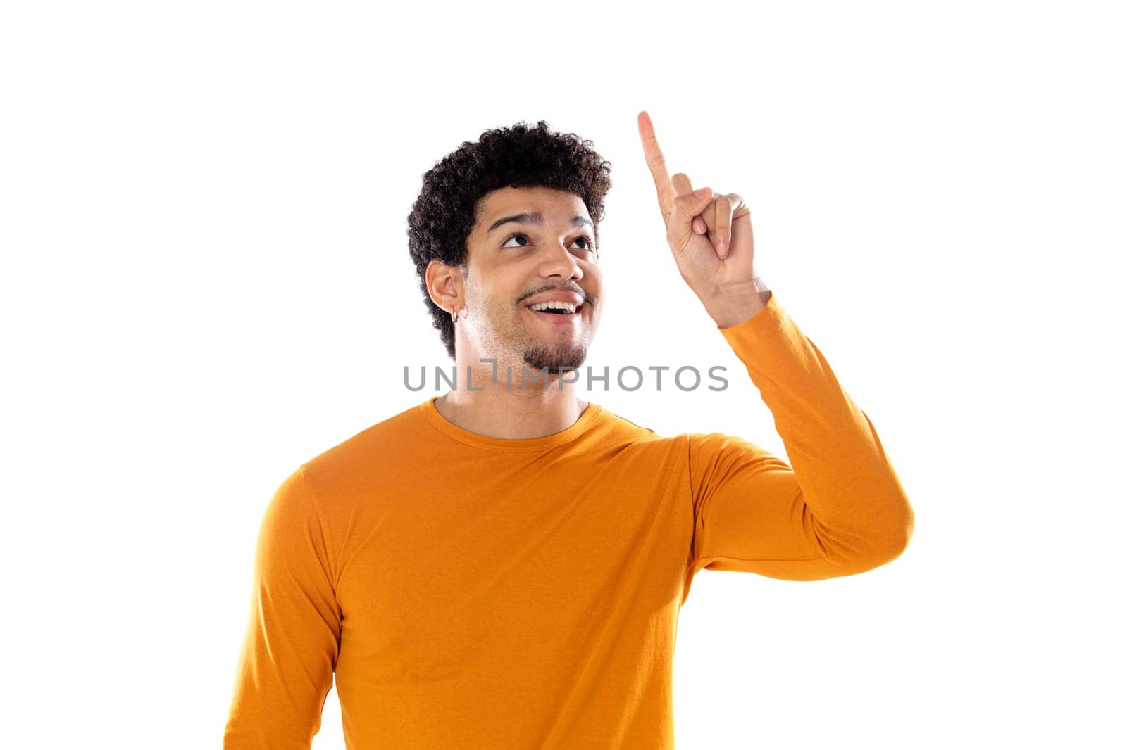 Young black afro guy laughing and pointing to something with his finger isolated on a white background