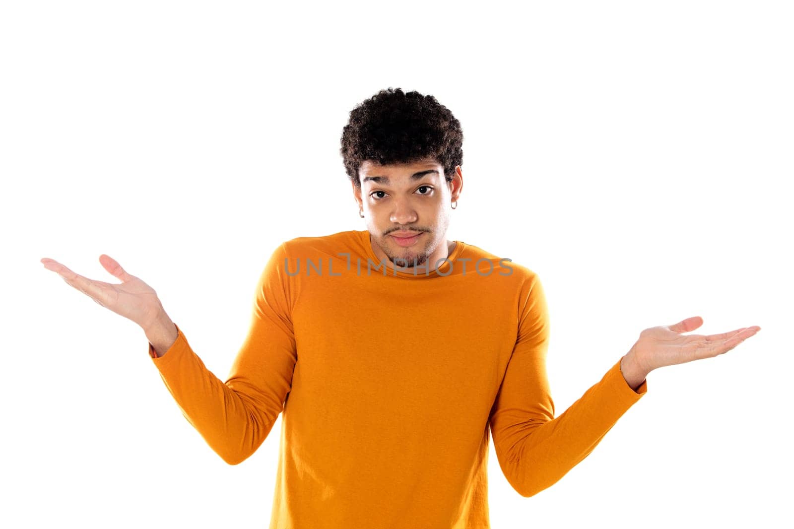 Puzzled afro guy wearing a orange sweater isolated on a white background