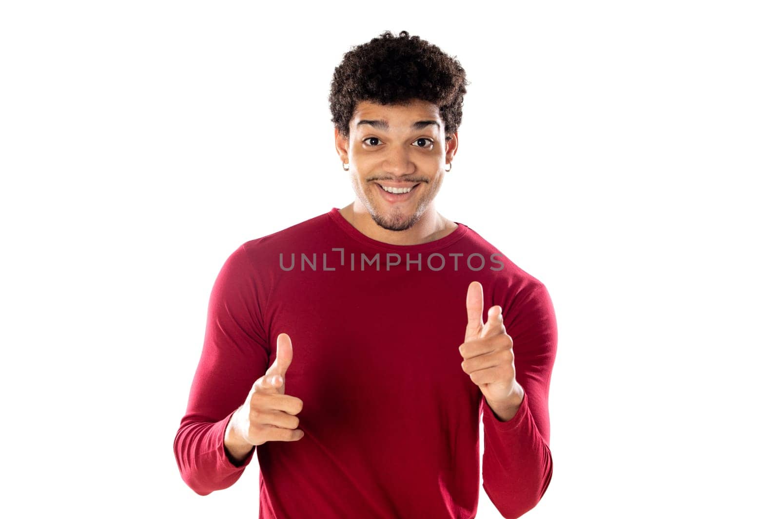 Cute african american man with afro hairstyle wearing a burgundy T-shirt isolated on a white background