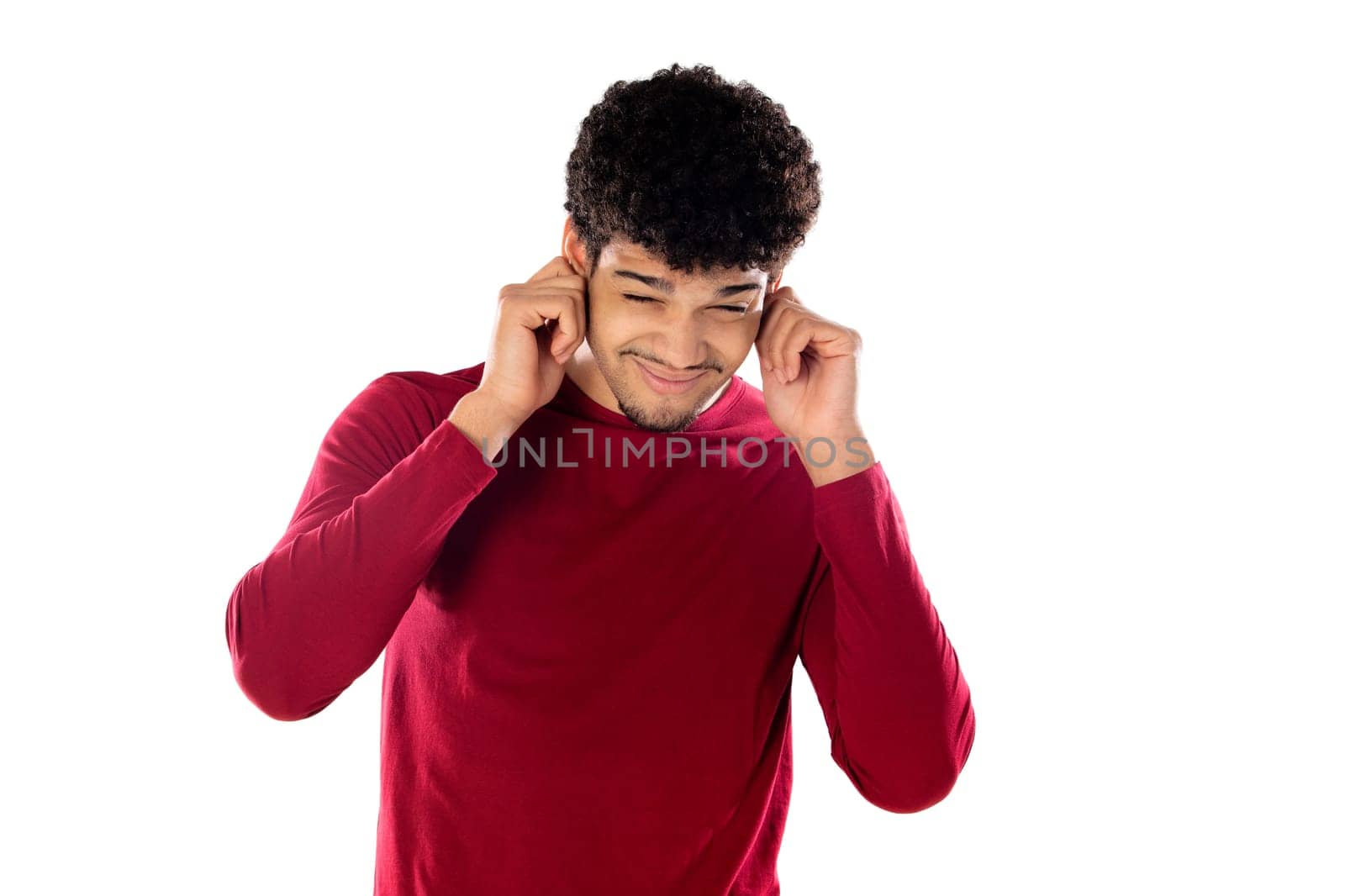 Cute african american man with afro hairstyle wearing a burgundy T-shirt isolated on a white background