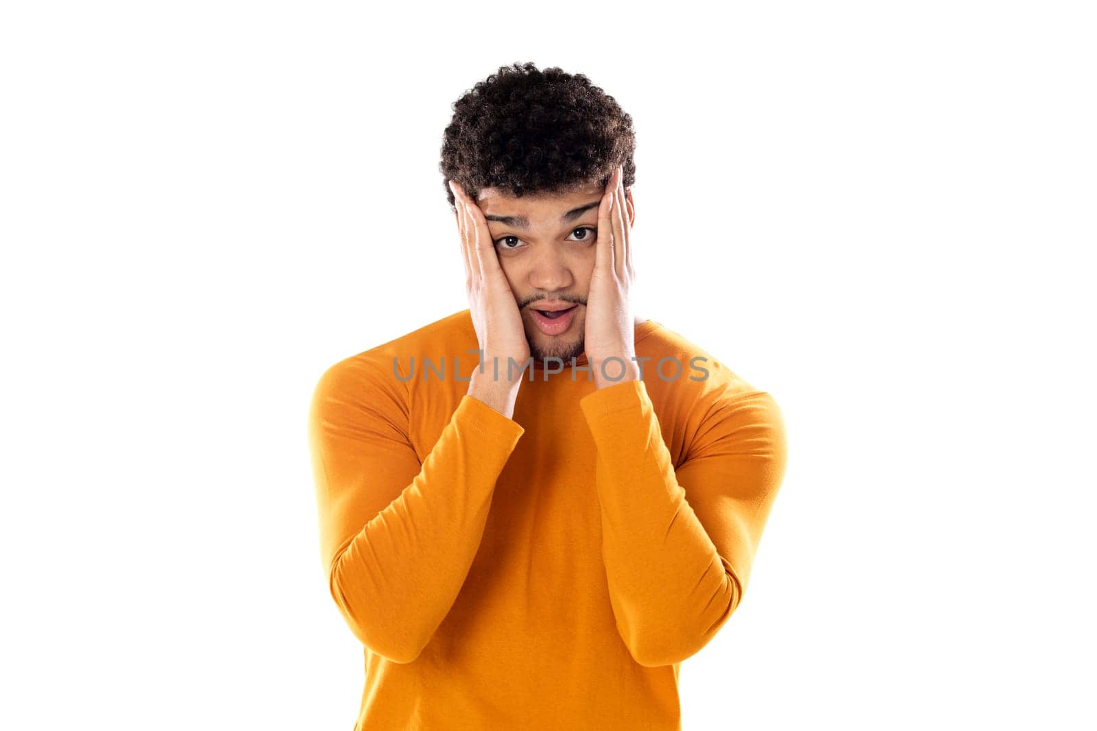 Cute african american man with afro hairstyle wearing a orange T-shirt isolated on a white background