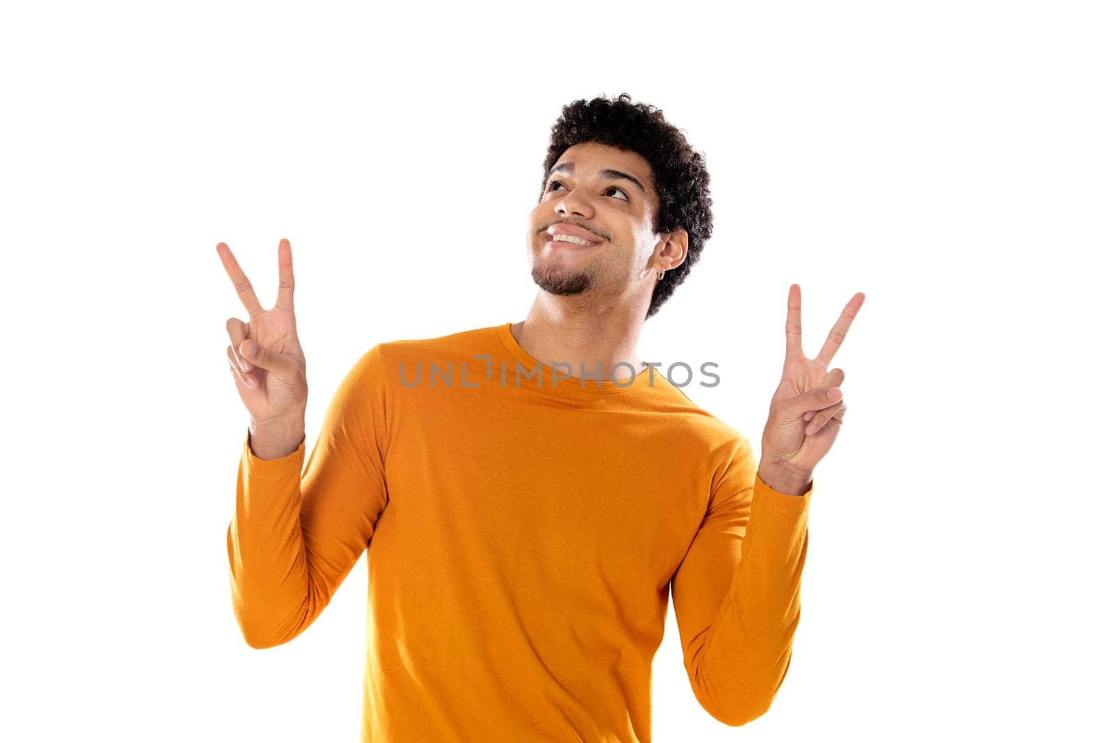 Afro guy making the victory sign isolated on a white background