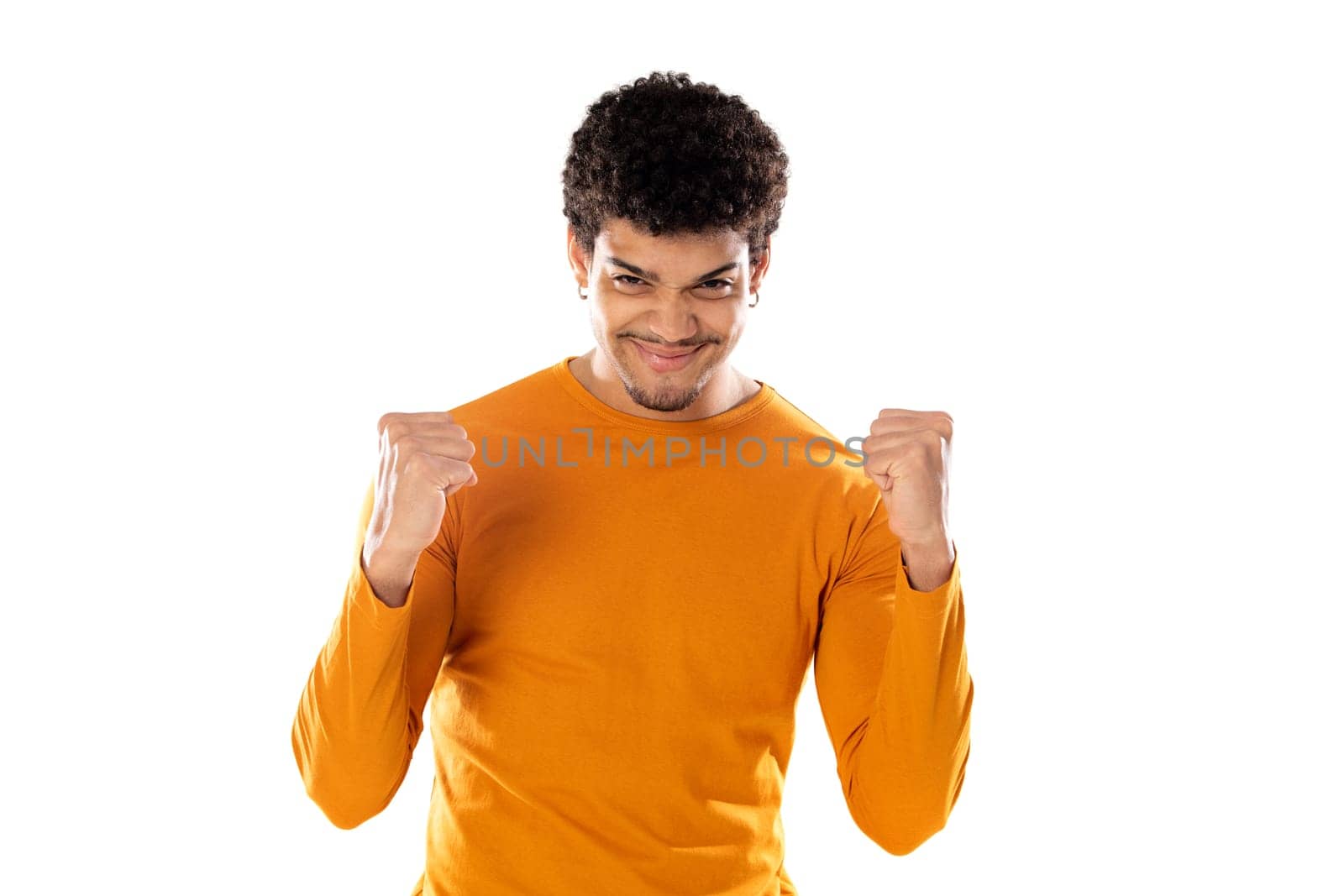 Cute african american man with afro hairstyle wearing a orange T-shirt isolated on a white background