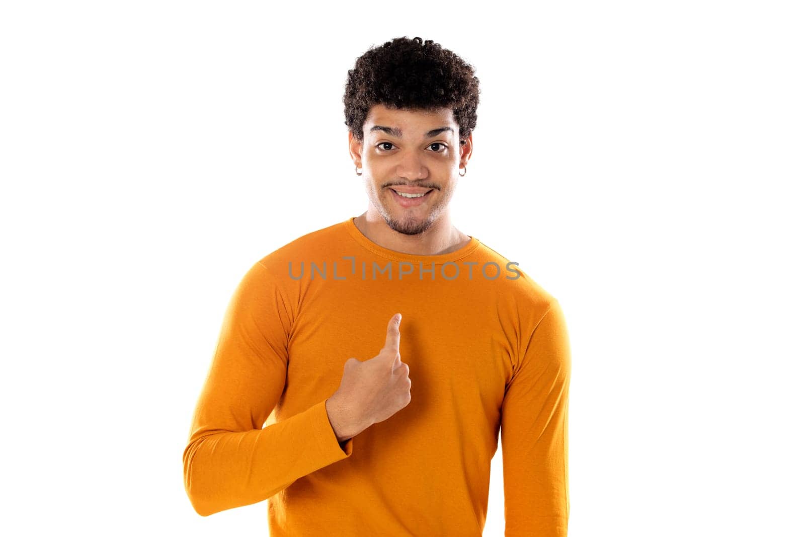 Cute african american man with afro hairstyle wearing a orange T-shirt isolated on a white background