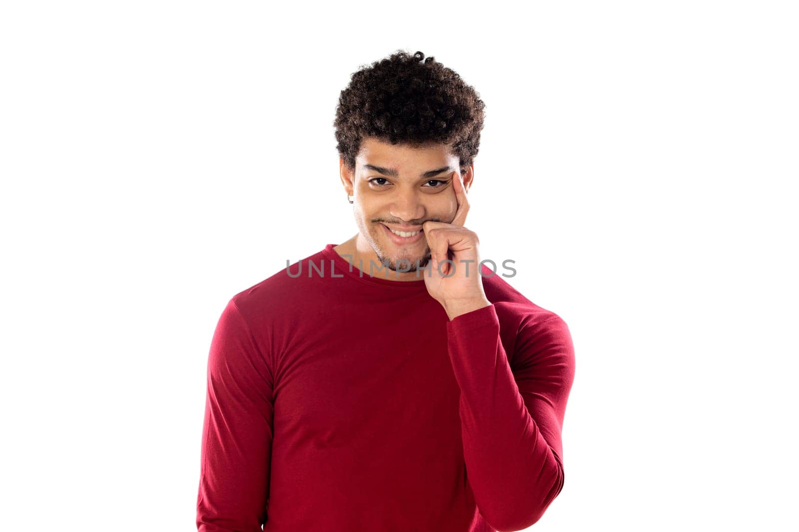 Cute african american man with afro hairstyle wearing a burgundy T-shirt isolated on a white background