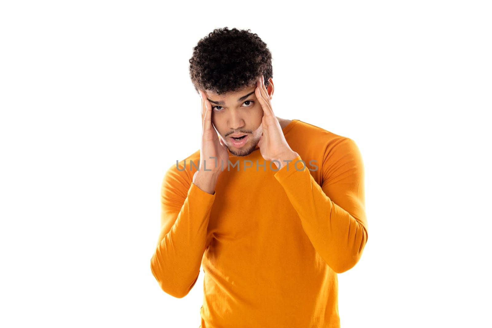 Cute african american man with afro hairstyle wearing a orange T-shirt isolated on a white background