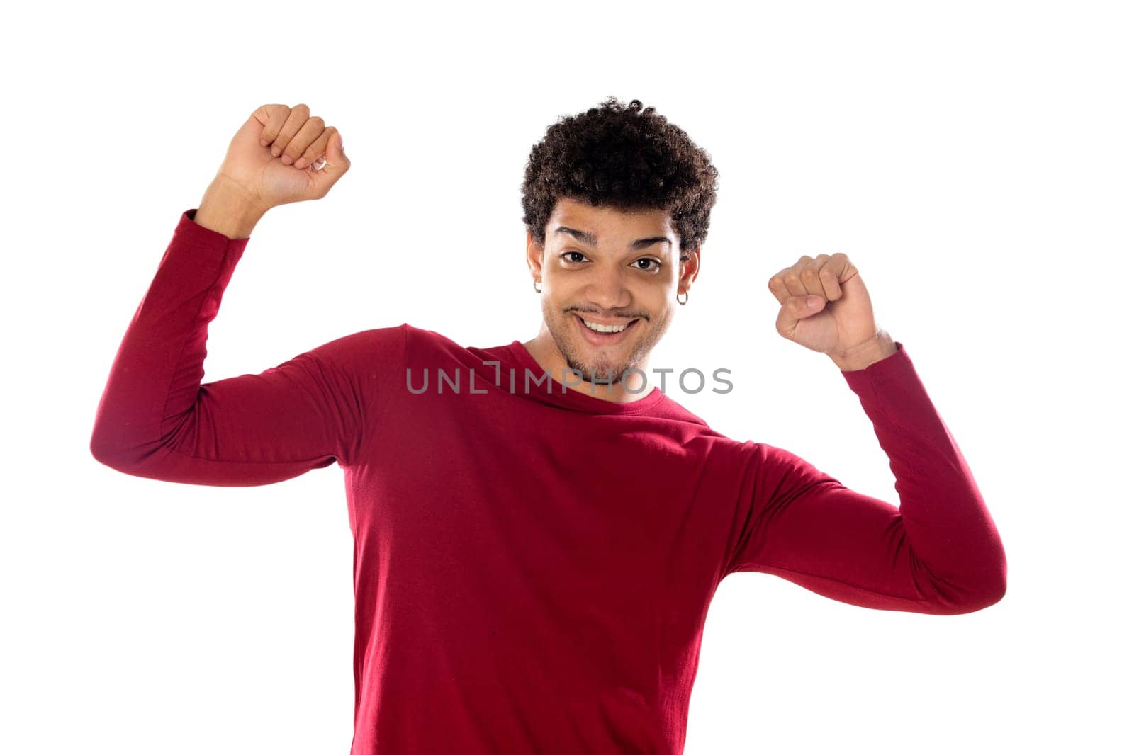 Cute african american man with afro hairstyle wearing a burgundy T-shirt isolated on a white background