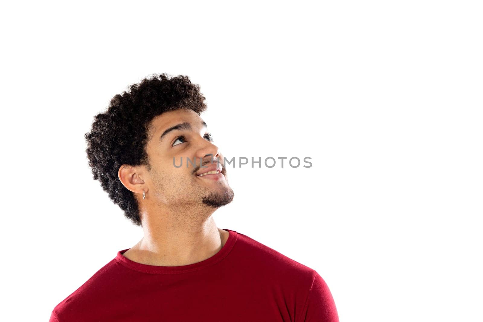 Cute african american man with afro hairstyle wearing a burgundy T-shirt isolated on a white background