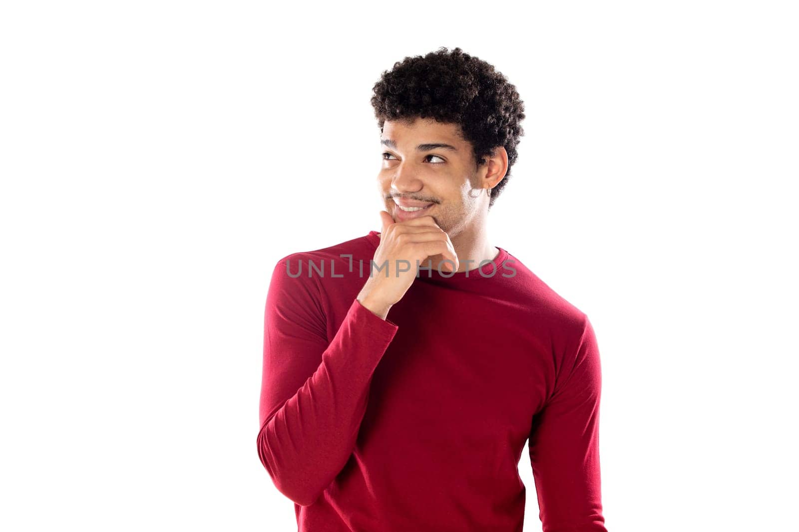 Cute african american man with afro hairstyle wearing a burgundy T-shirt isolated on a white background
