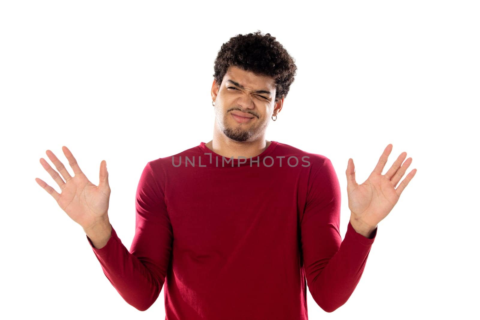 Cute african american man with afro hairstyle wearing a burgundy T-shirt isolated on a white background