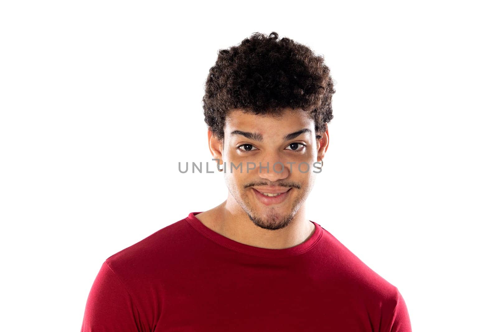Cute african american man with afro hairstyle wearing a burgundy T-shirt isolated on a white background