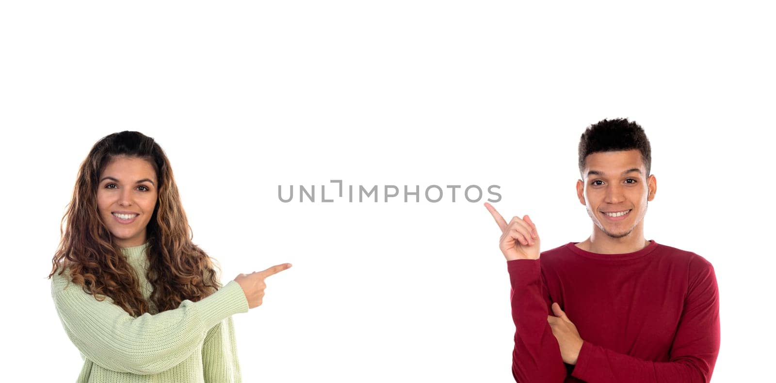 Attractive happy young multiethnic couple isolated on a white background