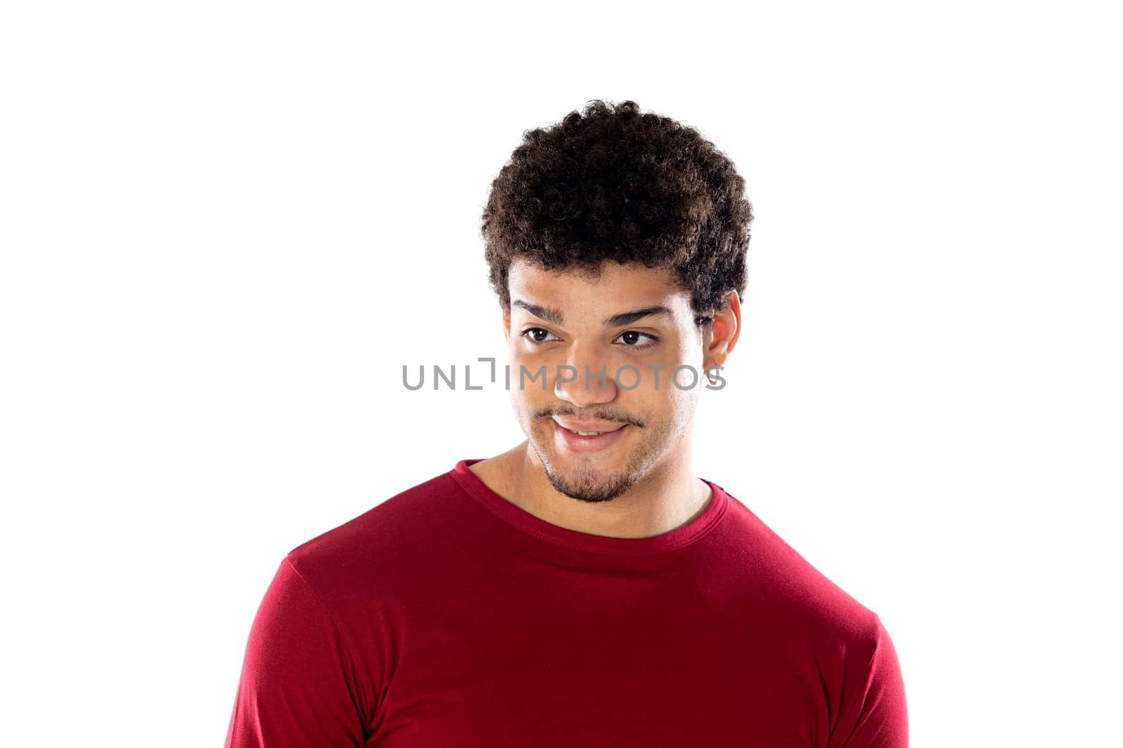 Cute african american man with afro hairstyle wearing a burgundy T-shirt isolated on a white background