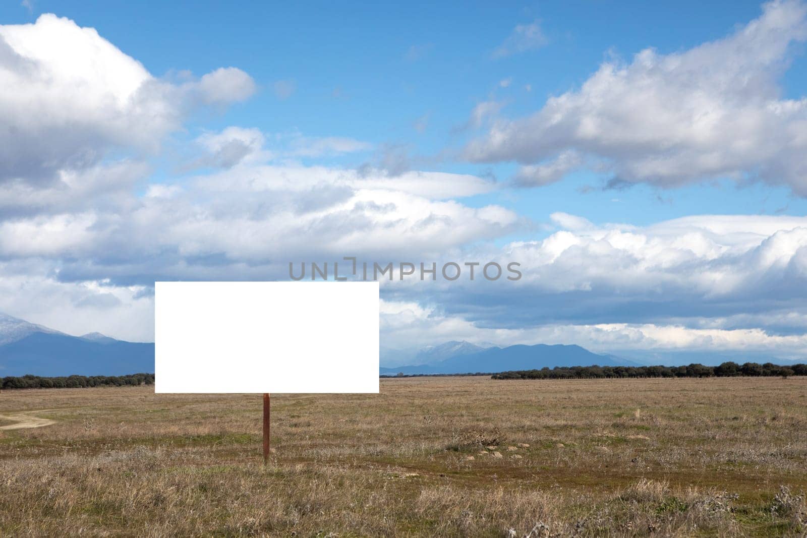 Blank cartel for advertising in the middle of the countryside