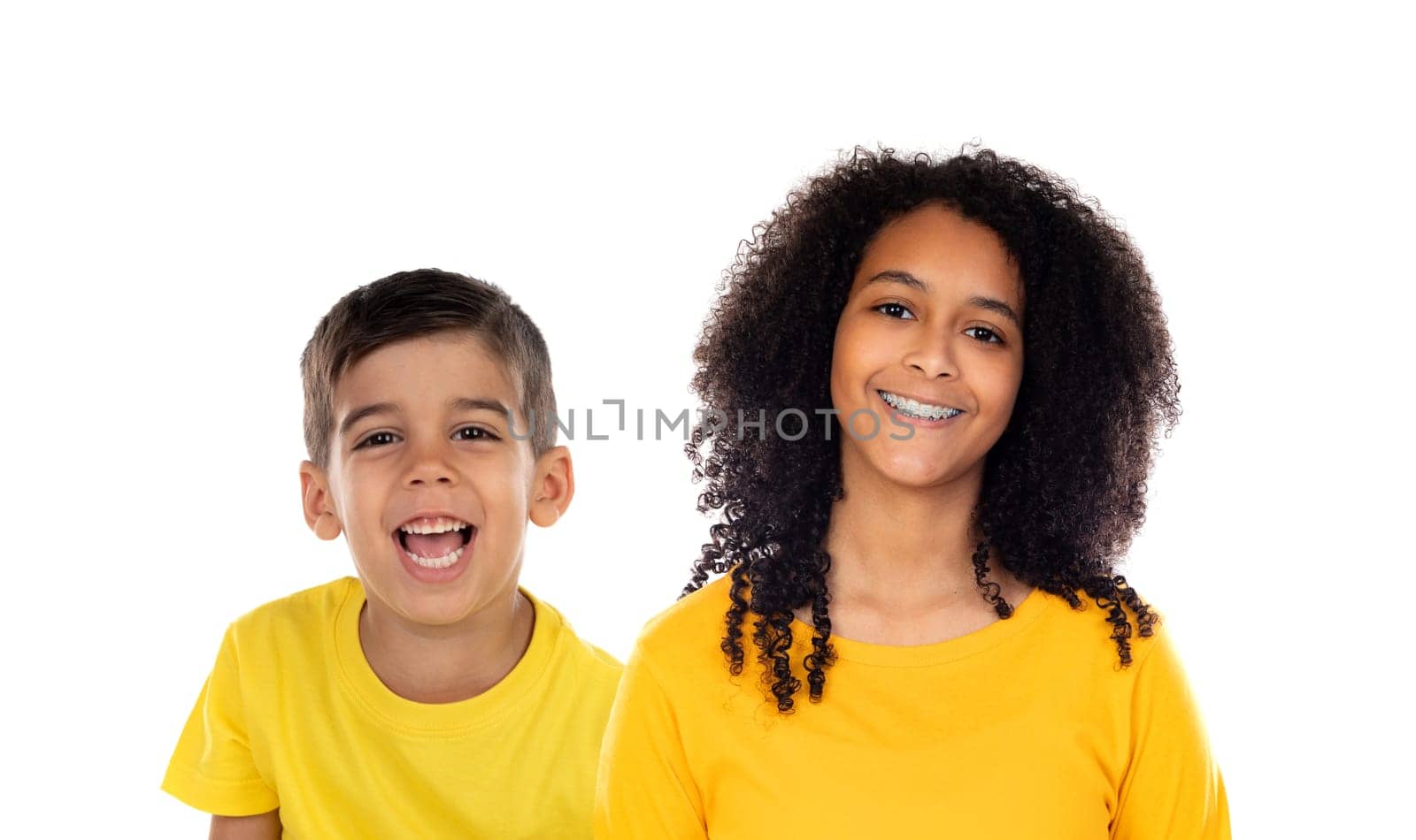 Two happy children with yellow t-shirt isolated on a white background