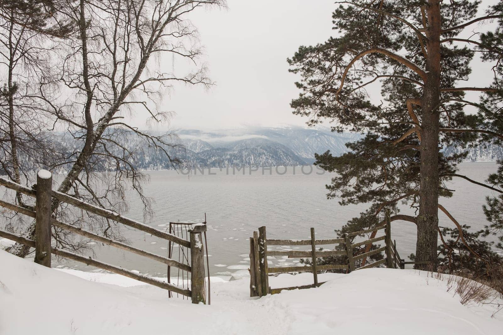 unfrozen Lake Teletskoye in winter. Russia Altai Krai.