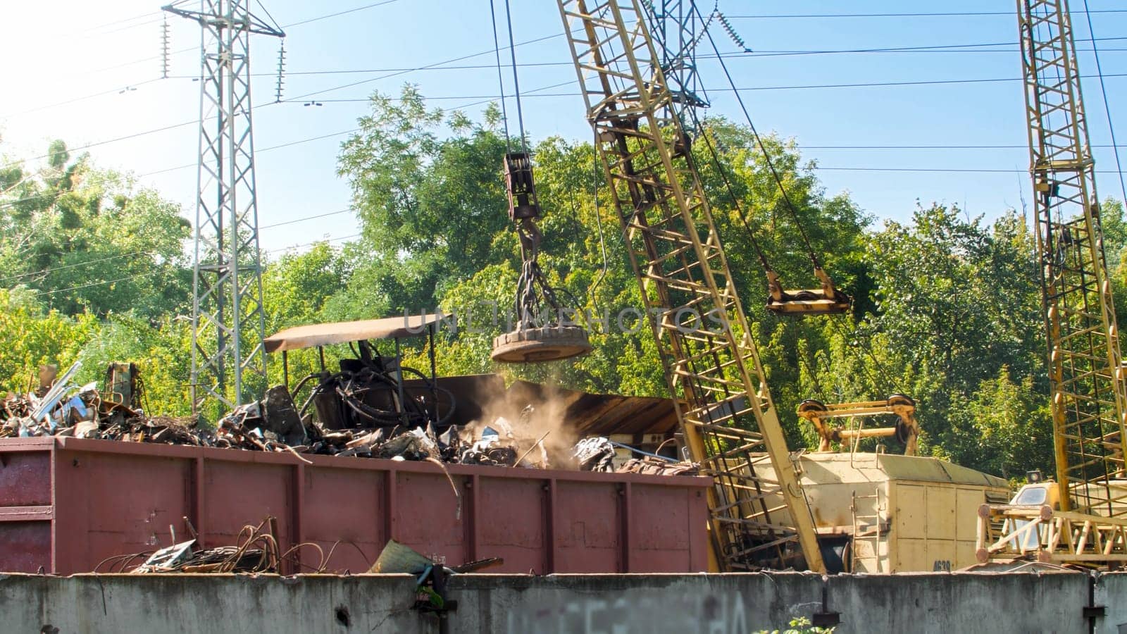 Photo of junkyard with old metal waste in industrial zone