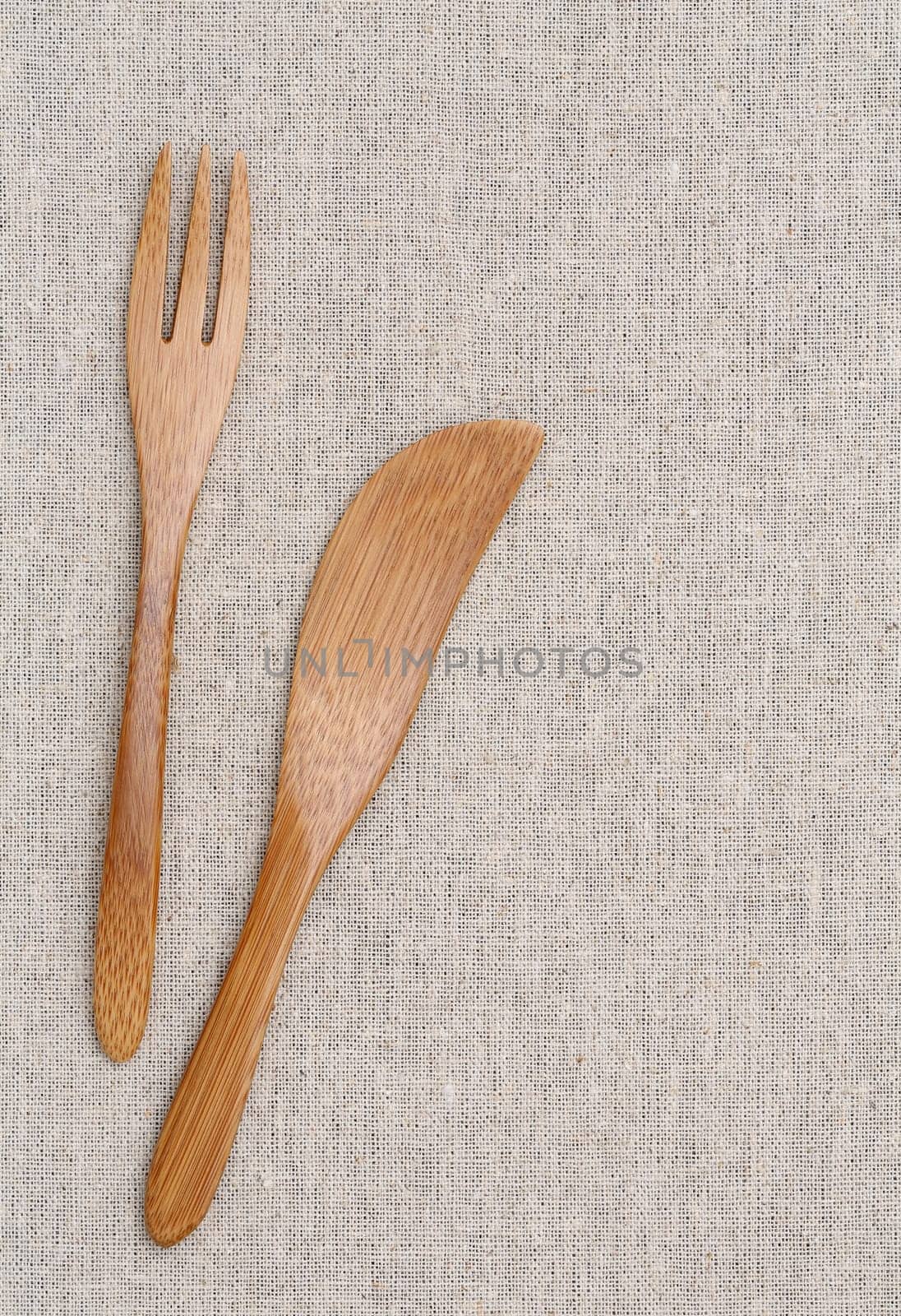 Wooden fork and knife on the table
