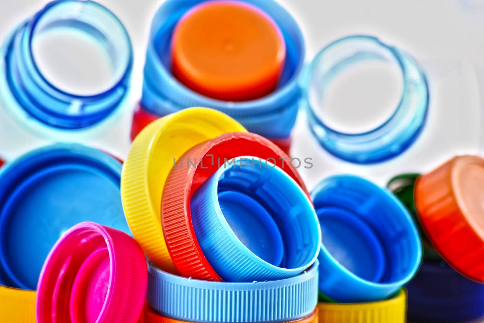 Composition with plastic bottles and caps.