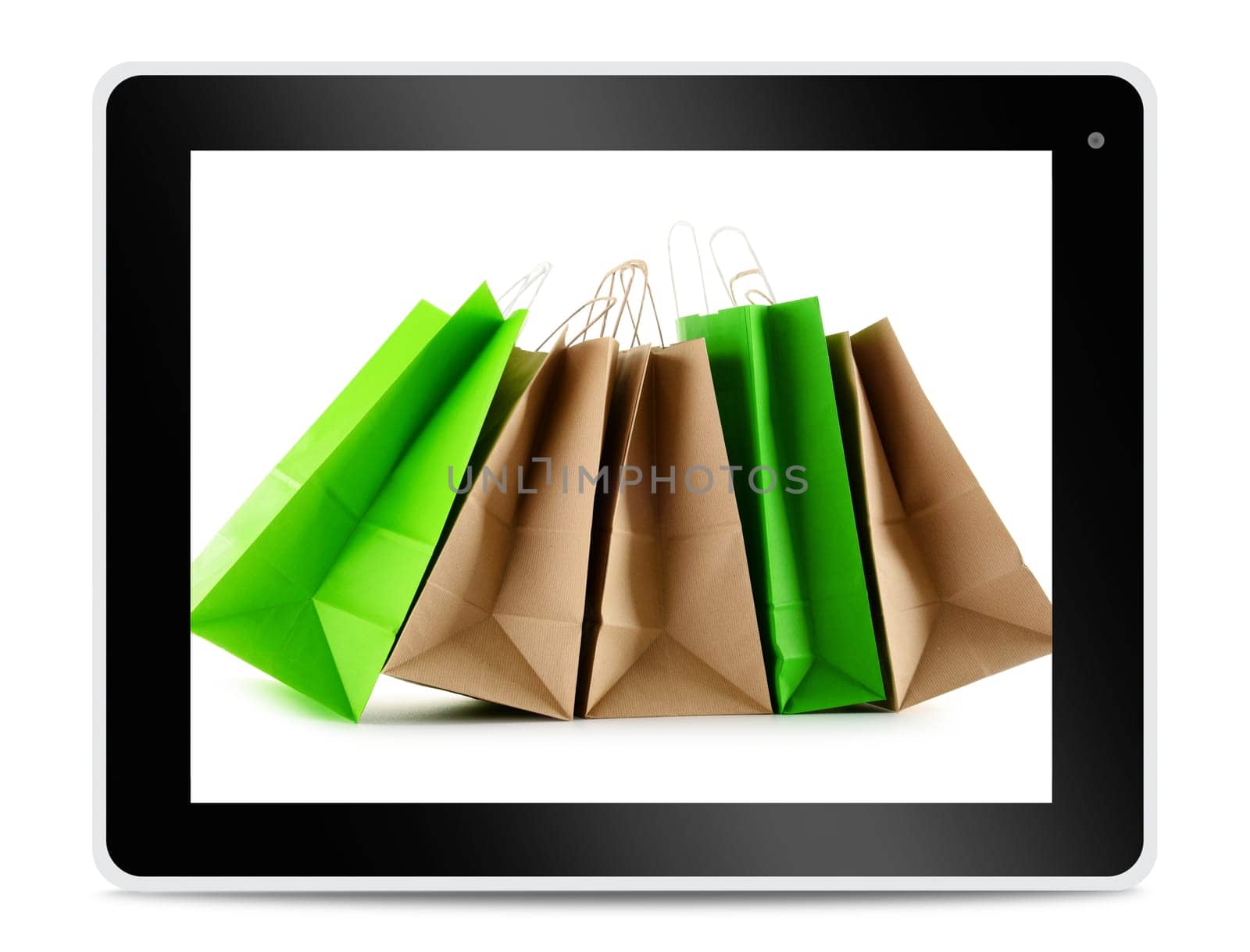 Paper shopping bags on computer tablet screen. Shopping online. E-commerce