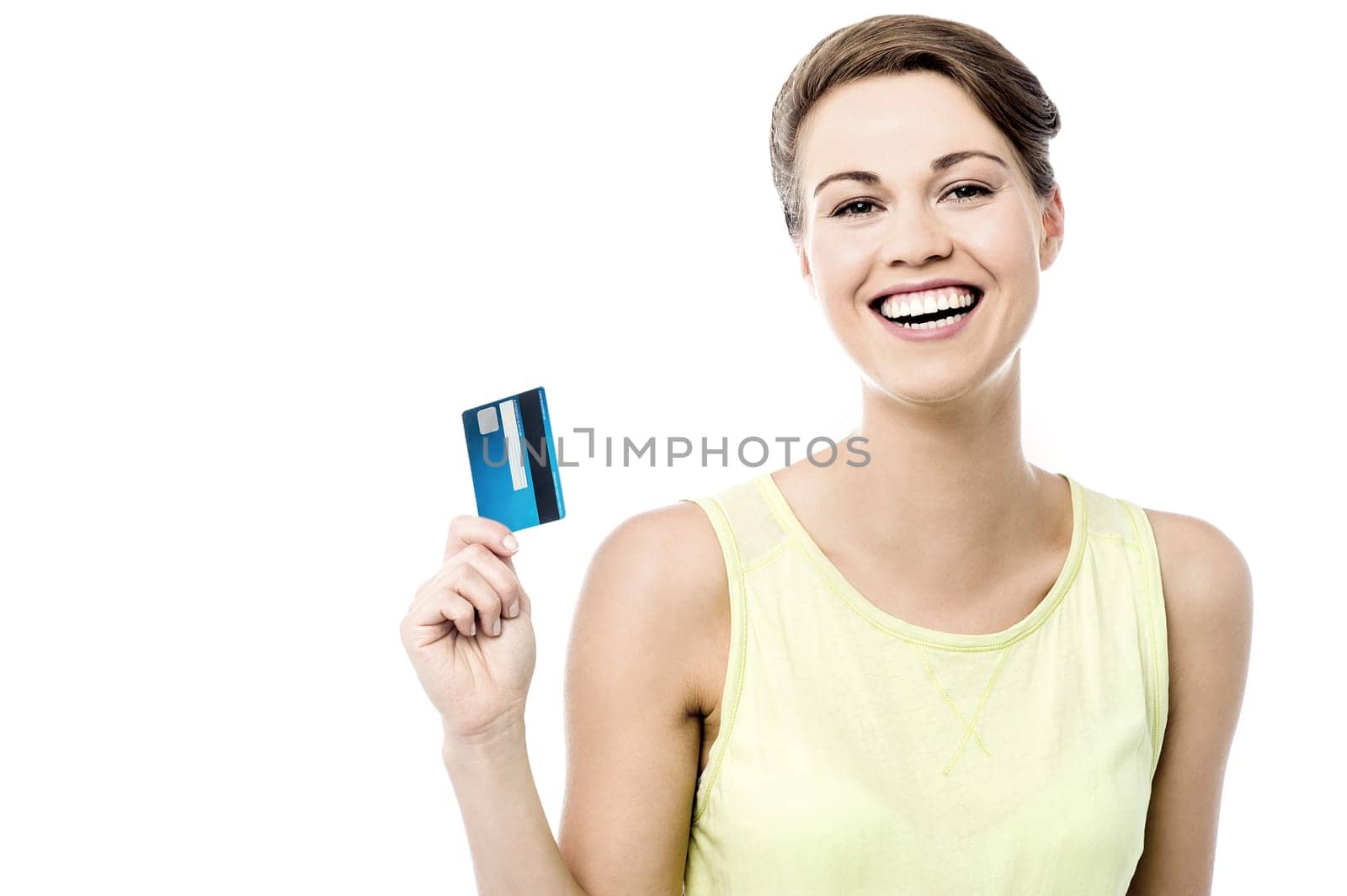 Cheerful woman showing her new credit card