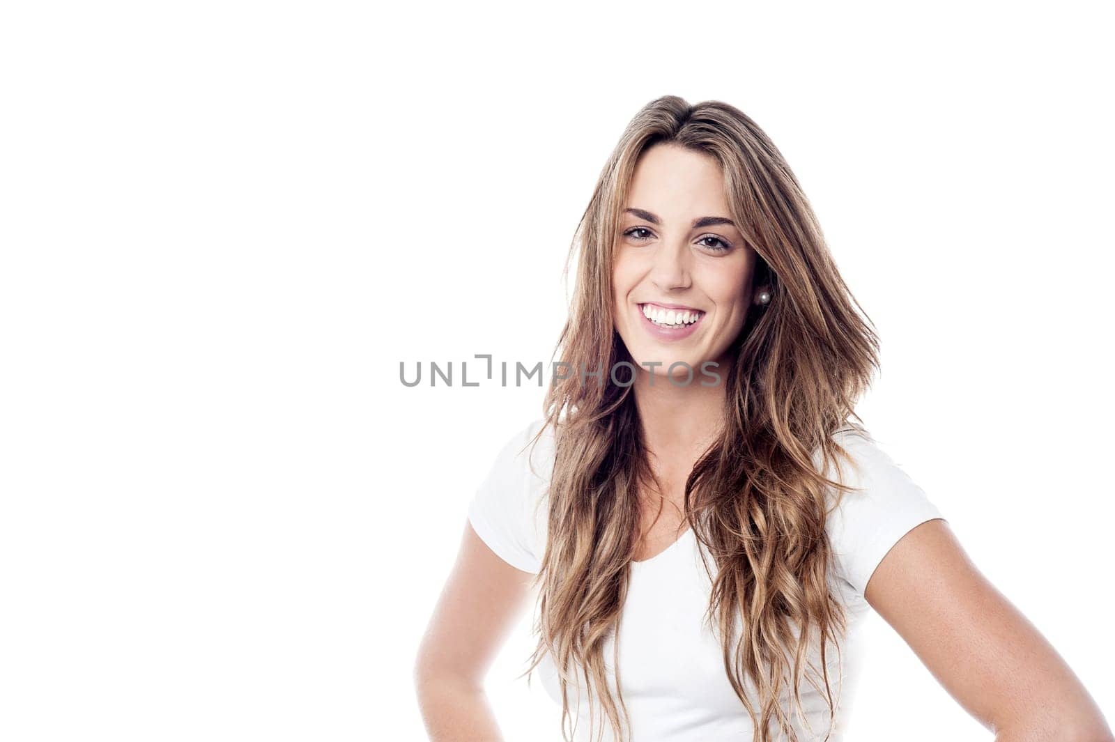 Smiling woman looking at camera over white