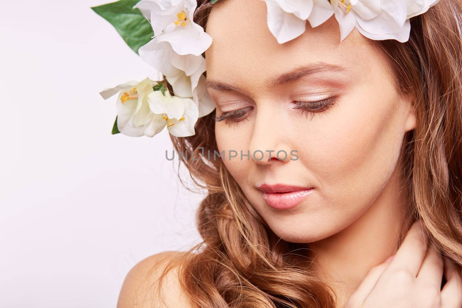Young woman in floral wreath