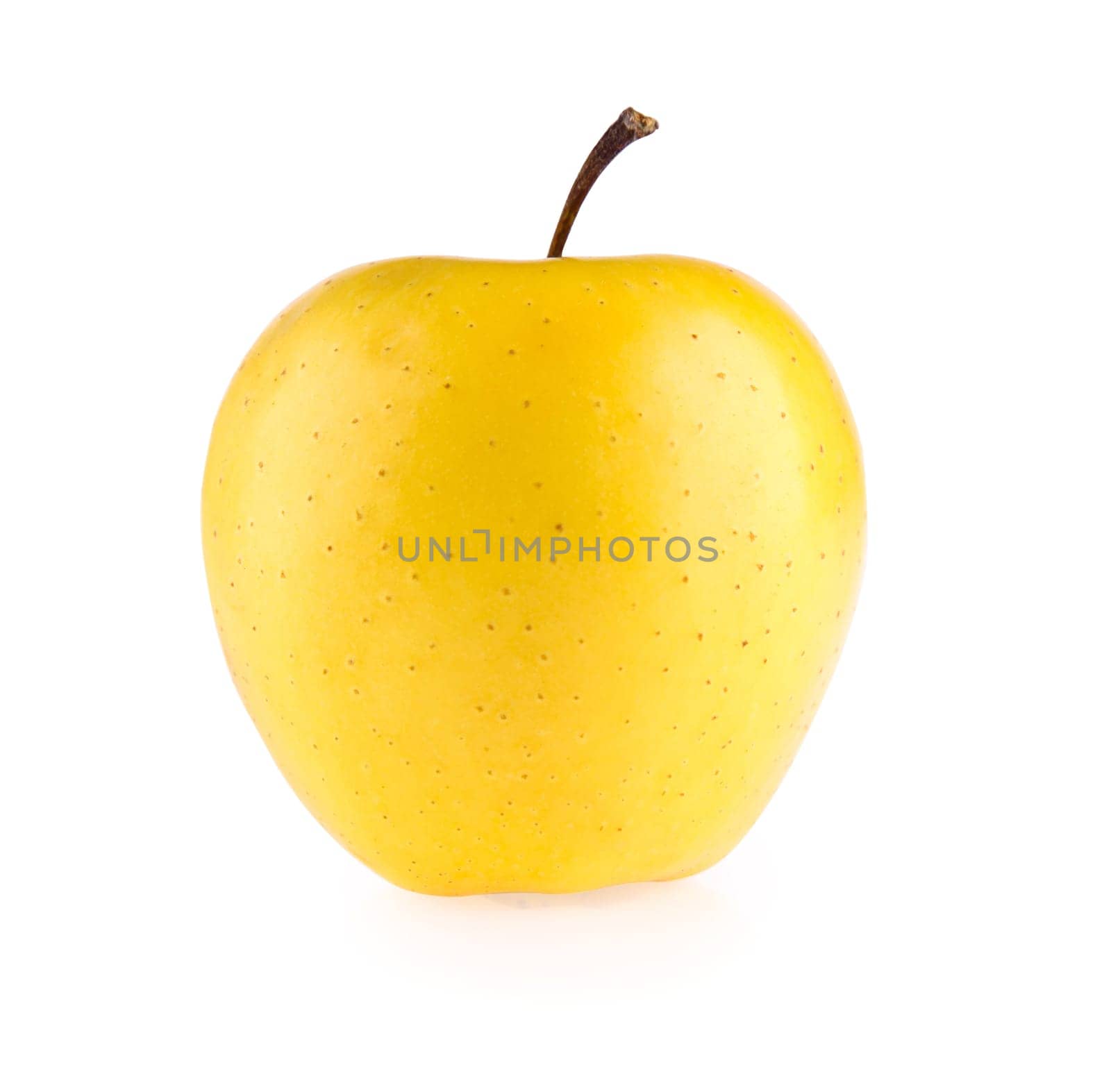 ripe yellow apple isolated on white