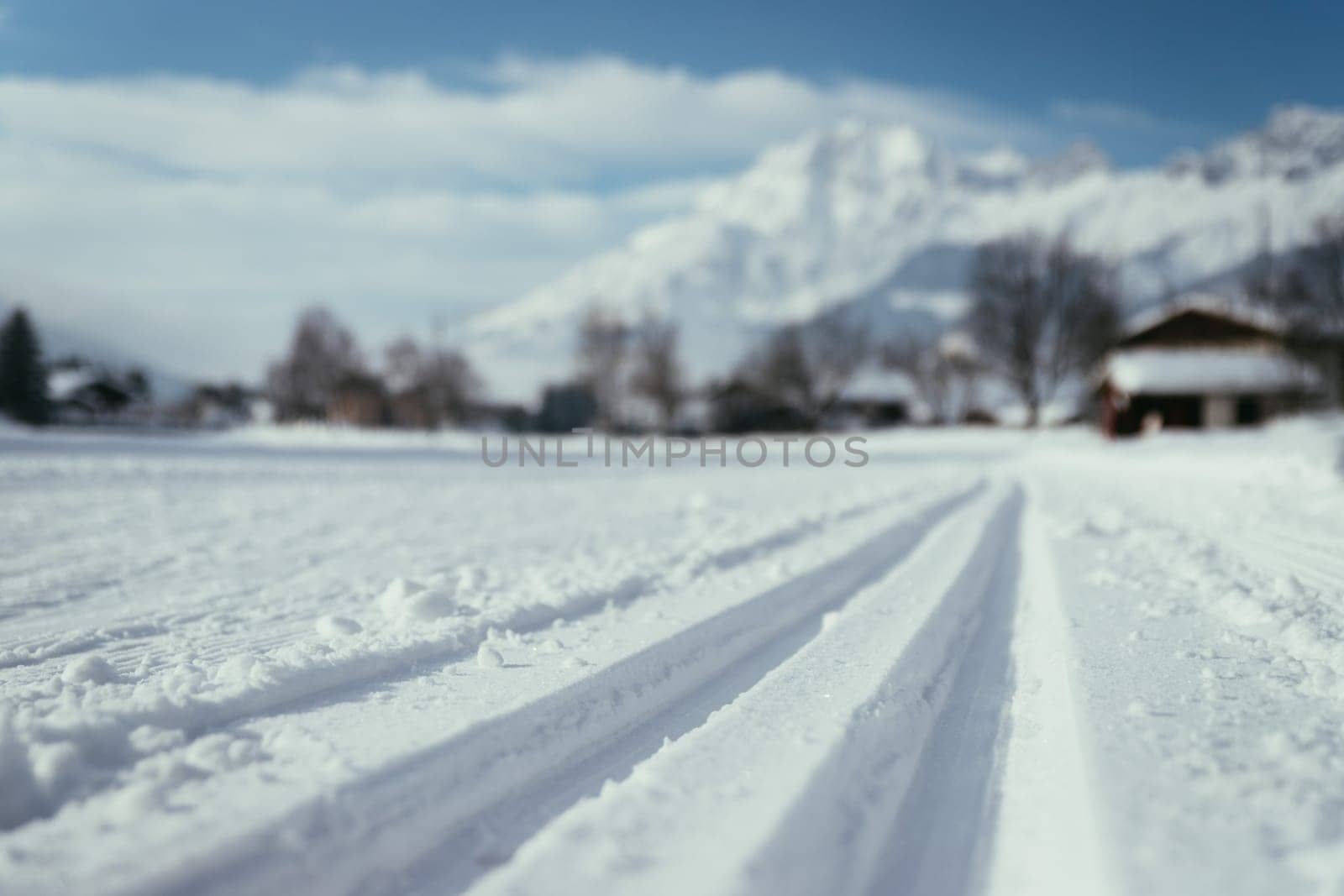 Cross-country skiing slope in Austria, beautiful mountain scenery, blurry background