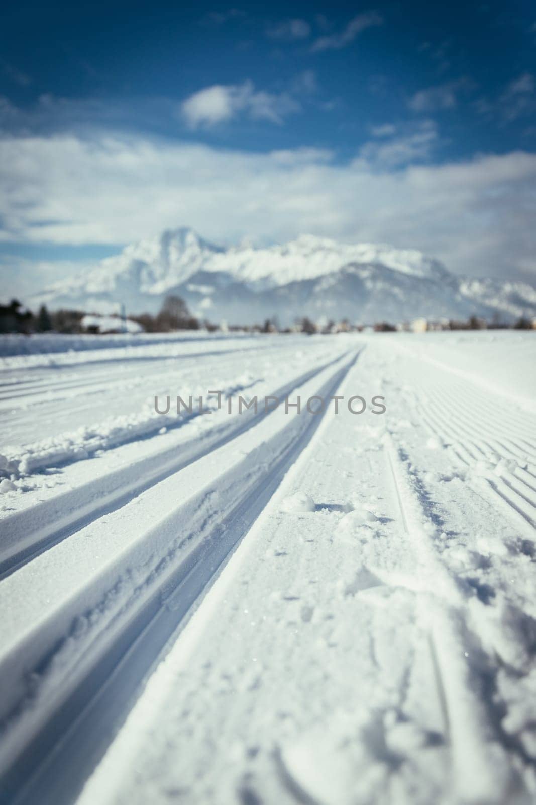 Cross-country skiing slope in Austria, beautiful mountain scenery, blurry background
