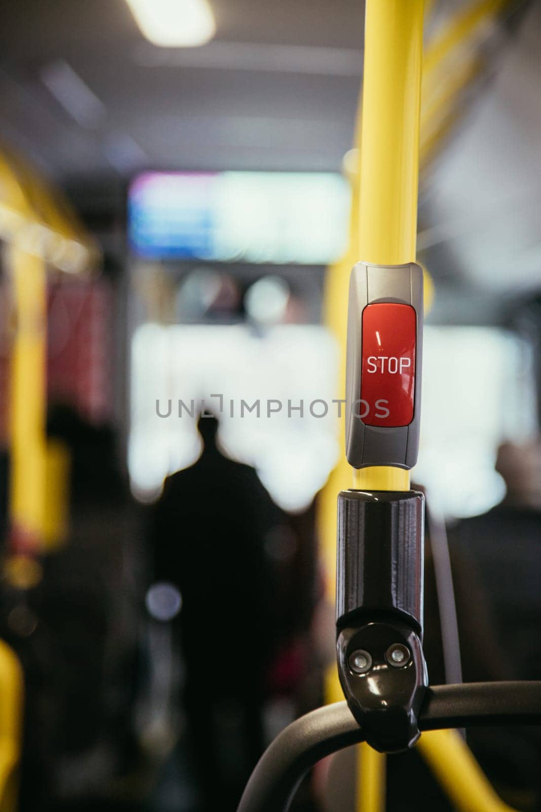 Stop Button in a bus, public transport, blurry