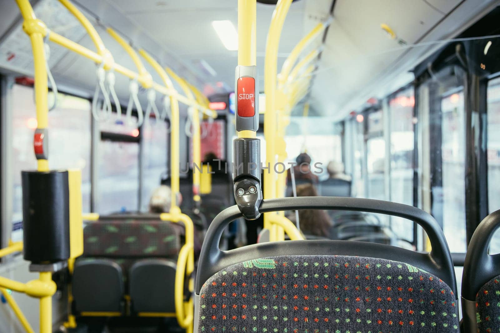 Stop Button in a bus, public transport, blurry