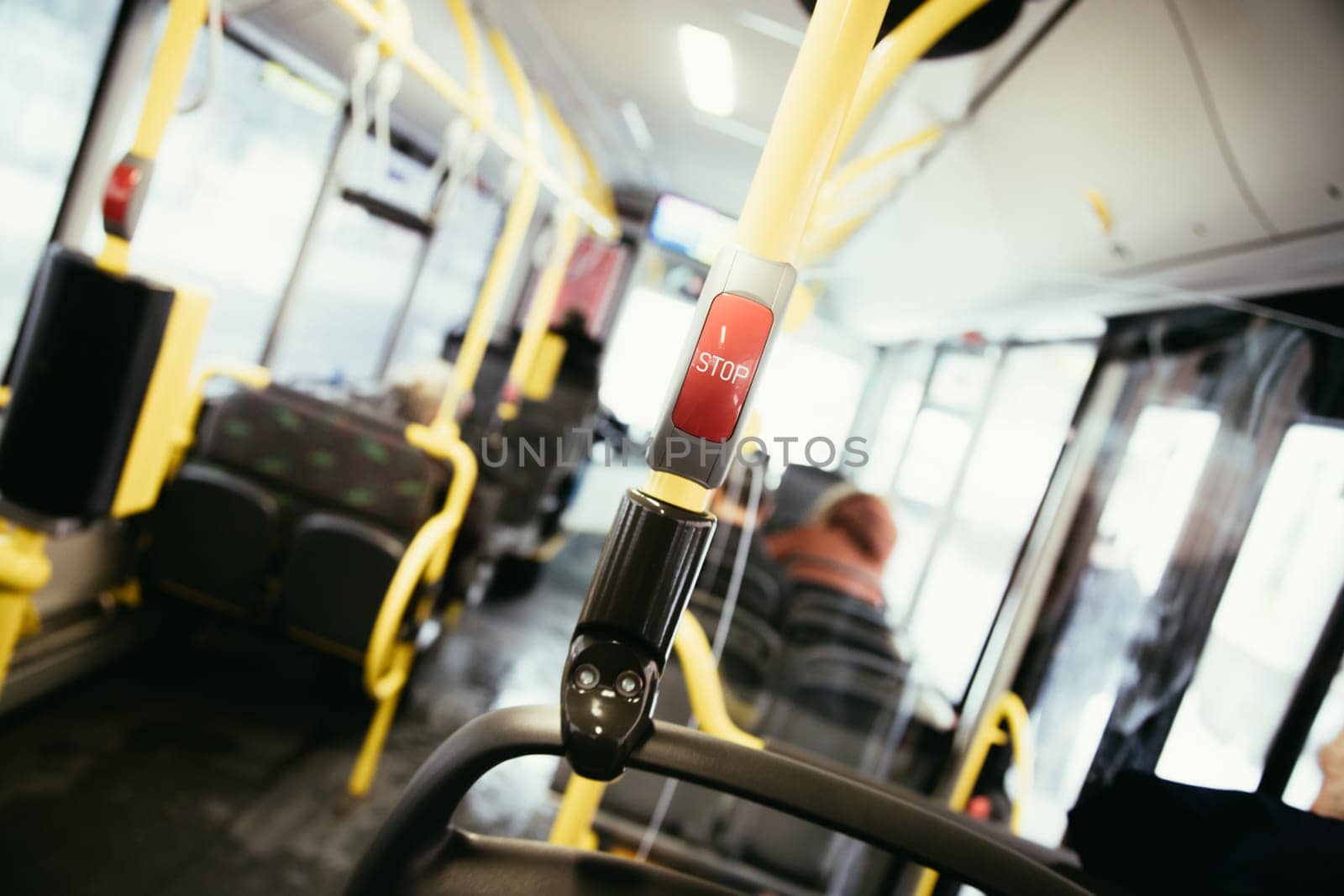 Stop Button in a bus, public transport, blurry