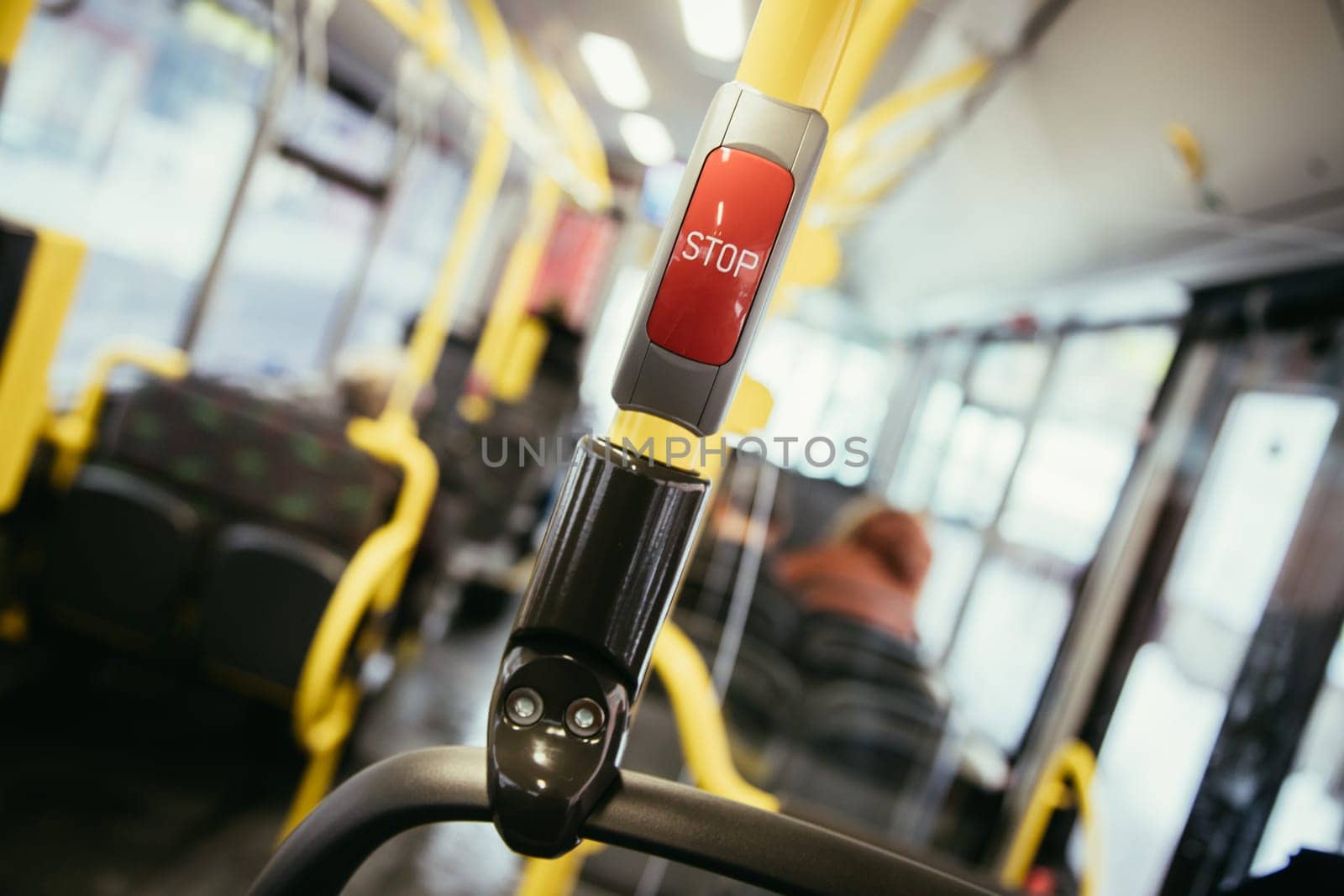 Stop Button in a bus, public transport, blurry