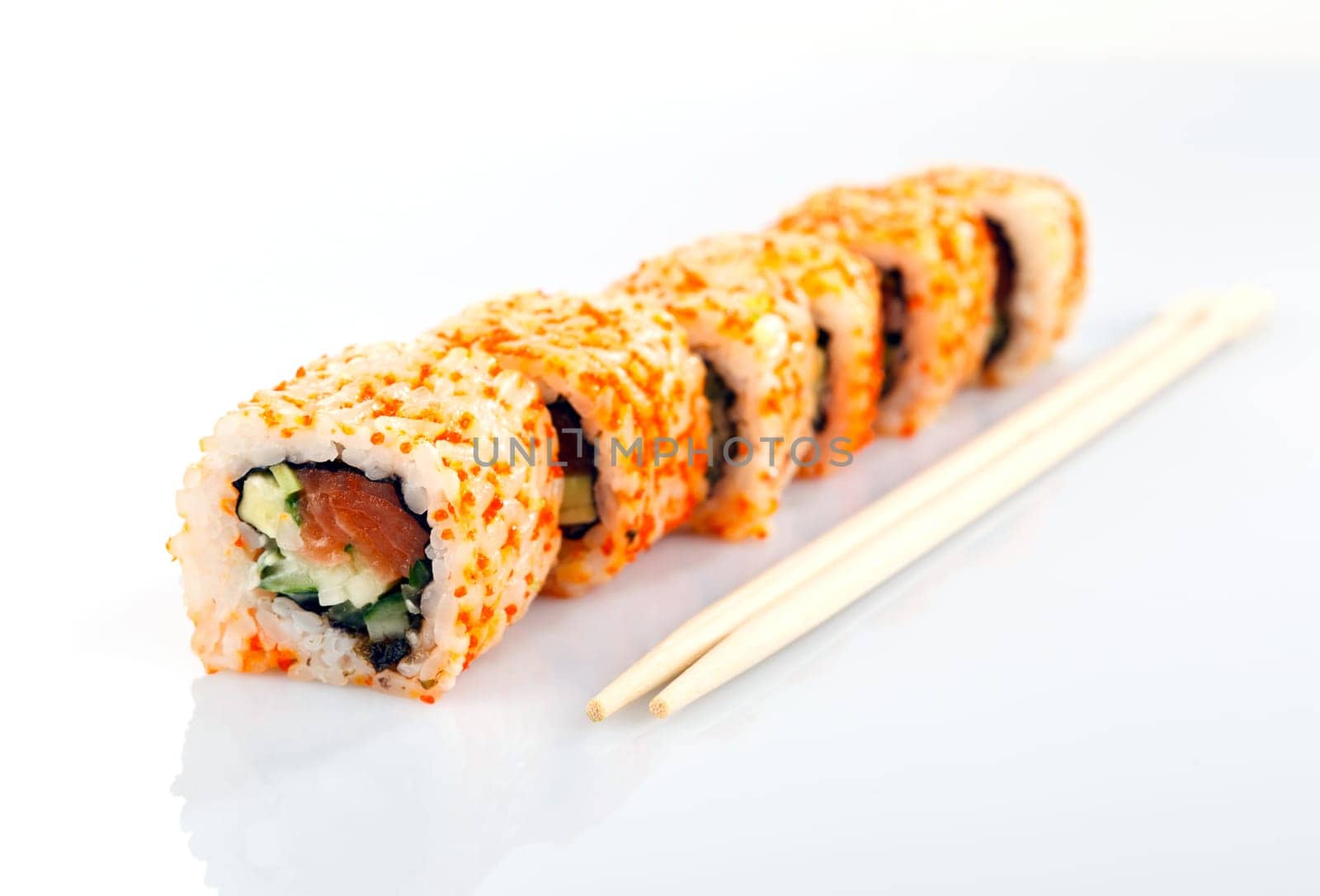 Traditional japanese sushi and chopsticks isolated on white background