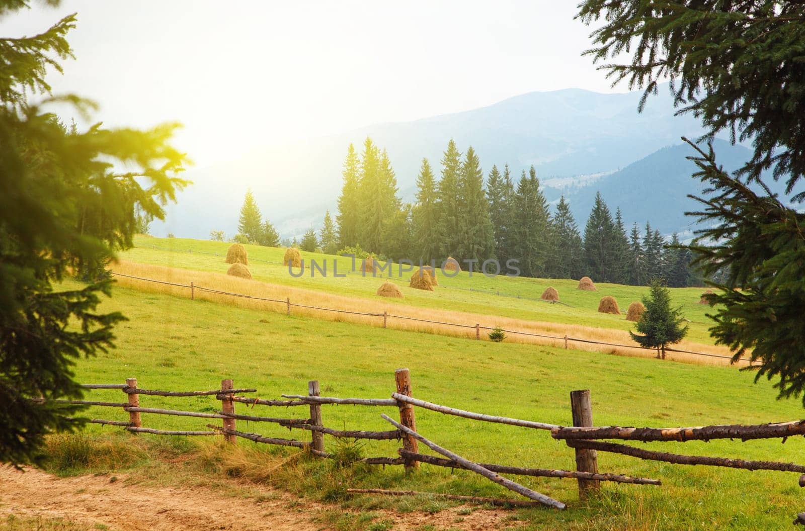 Summer mountain village landscape with blue sky