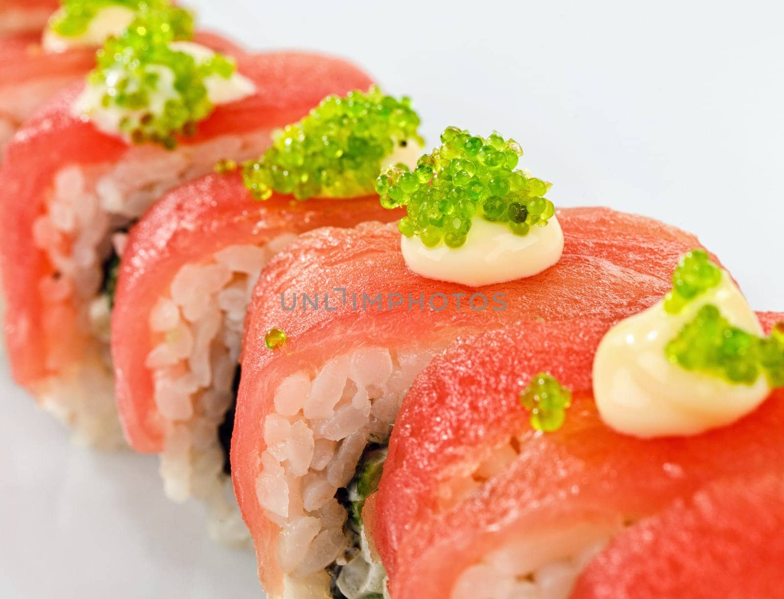 traditional fresh japanese sushi rolls on a white background