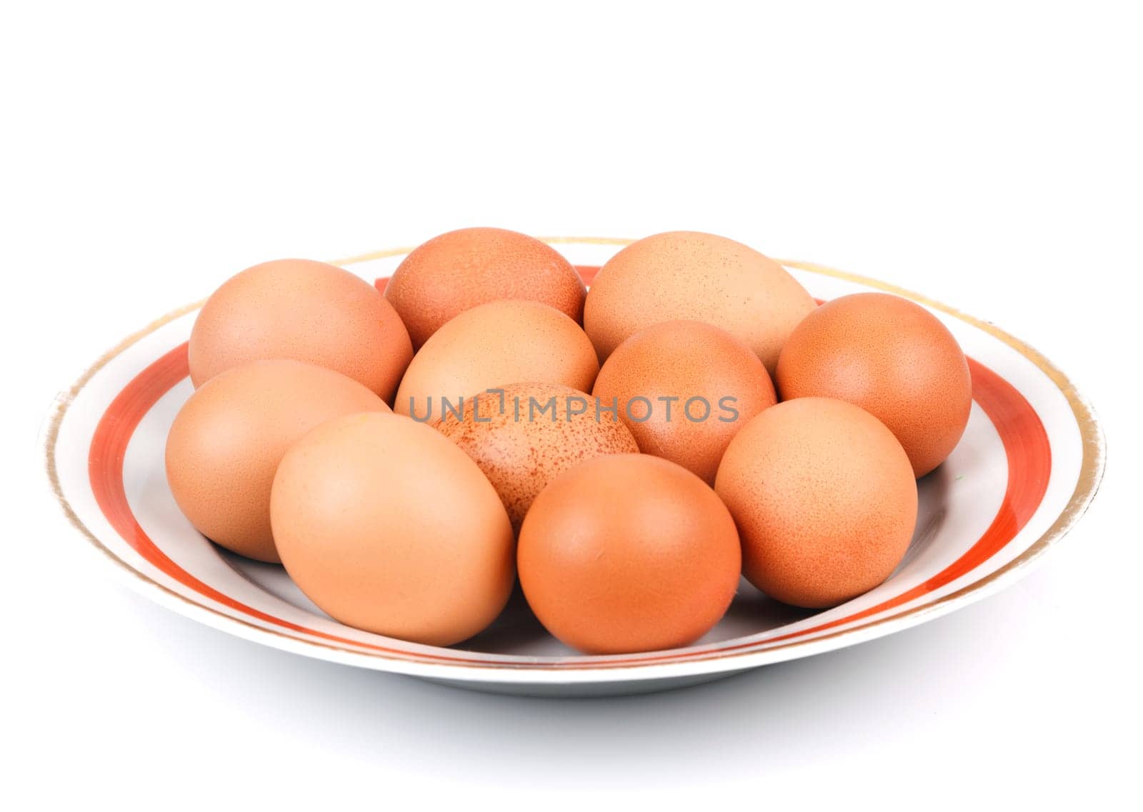 nature chicken eggs in a bowl isolated on white
