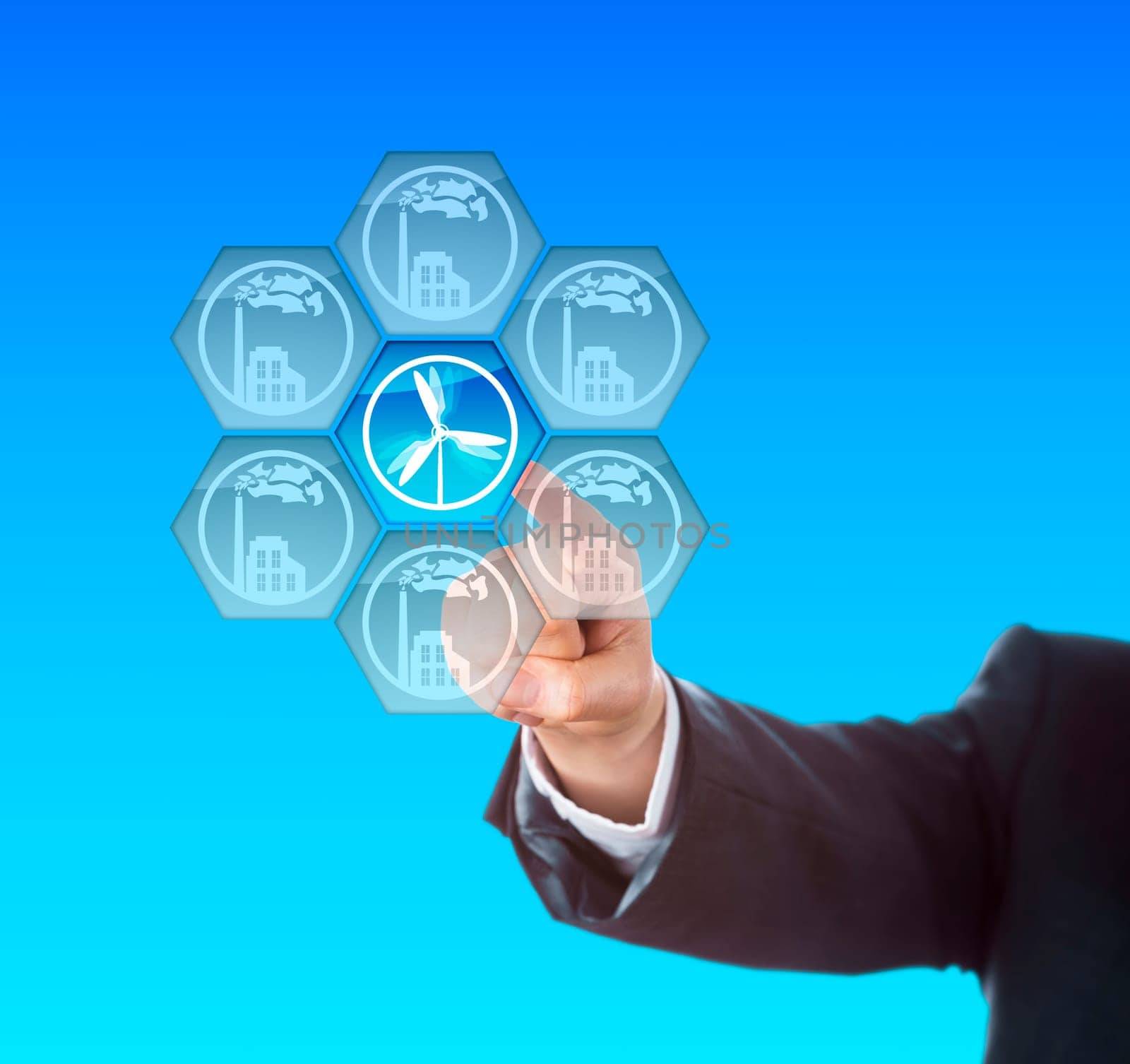 Electric power generation through wind energy. Arm of a business manager activating a wind turbine symbol on a touch screen interface. Metaphor for energy transition, the so called Energiewende.