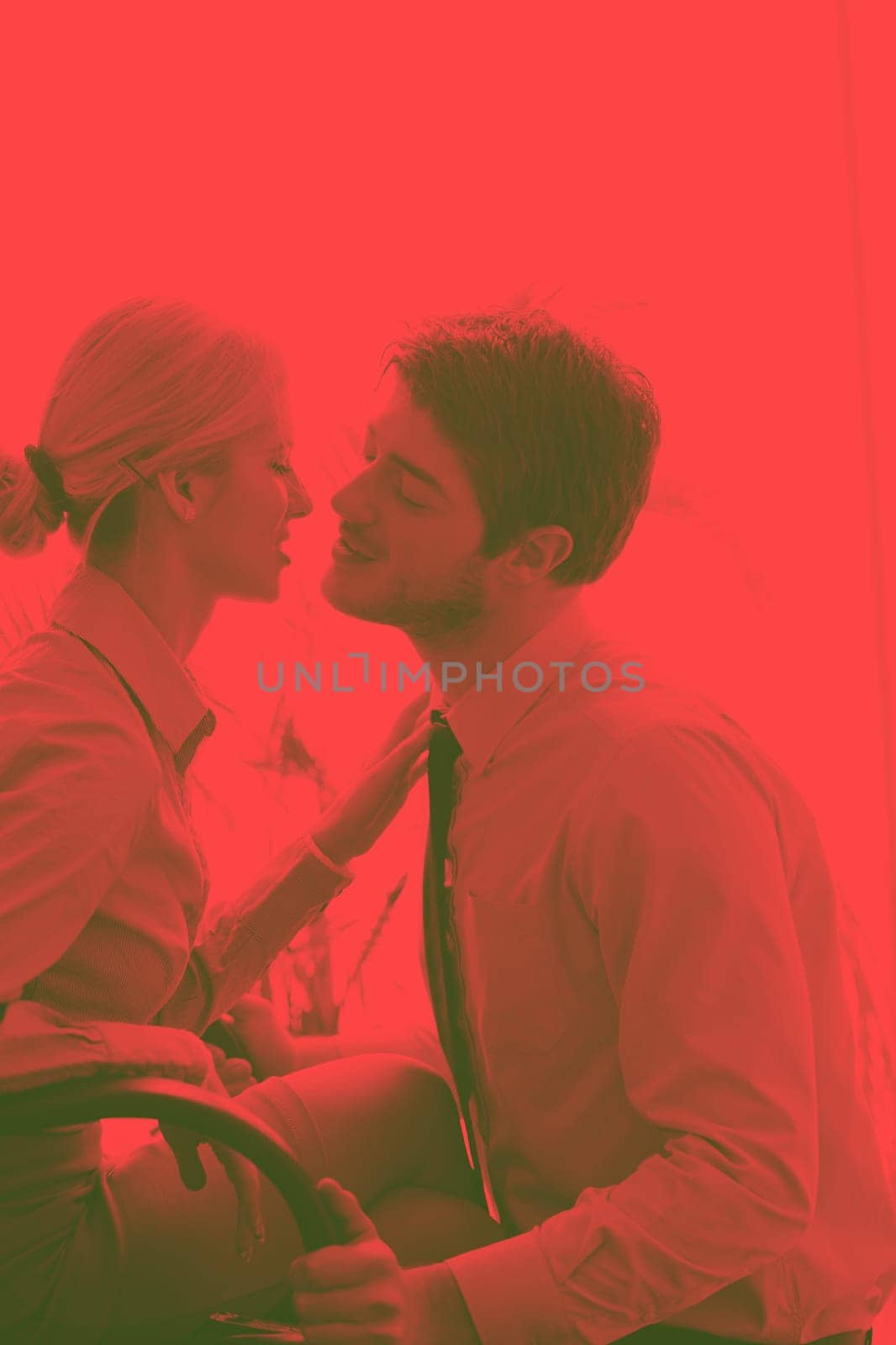 business people in love  have romantic time at workplaceduo tone