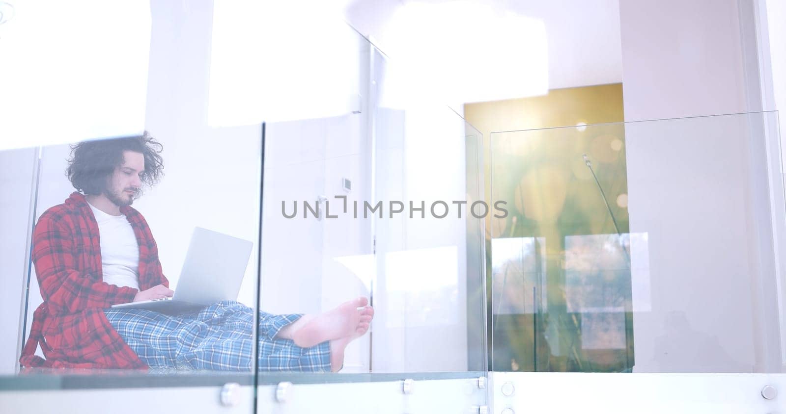 Real man Using laptop on the floor At Home  Enjoying Relaxing