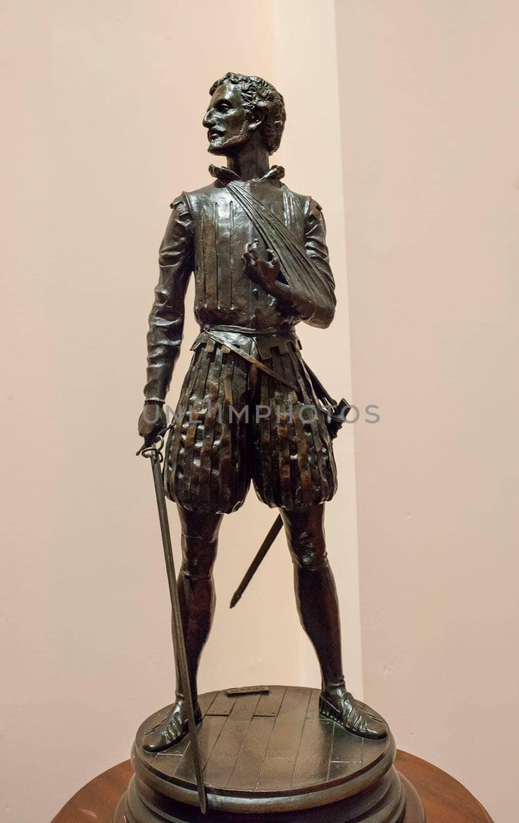 Madrid, Spain - March 6th, 2021: Miguel de Cervantes Saavedra statuette, depicted as Battle of Lepanto soldier. By Sergio Blanco, 1999. Museo Naval de Madrid