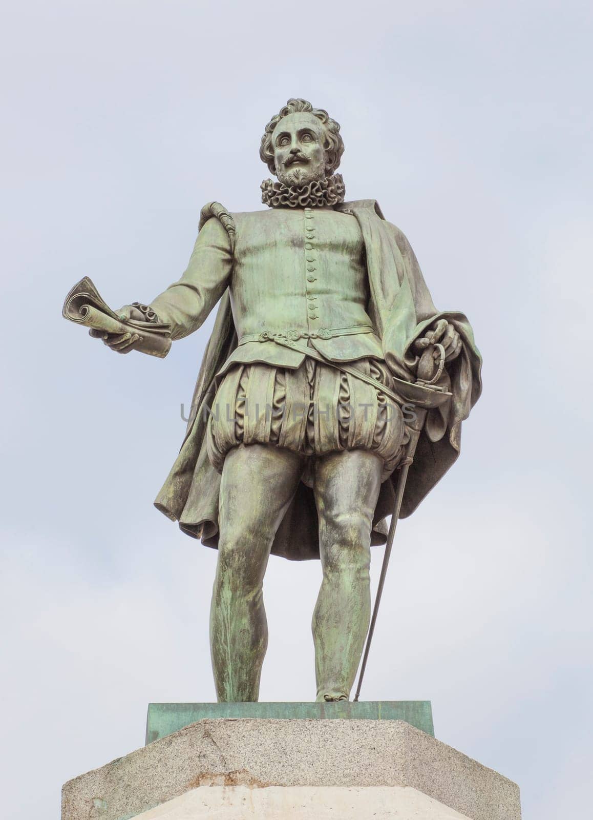 Spain, Madrid - March 6th, 2021: Miguel de Cervantes Saavedra statue. Erected in front of the Spanish Congress of Deputies, Madrid. By Antonio Sola in 1835