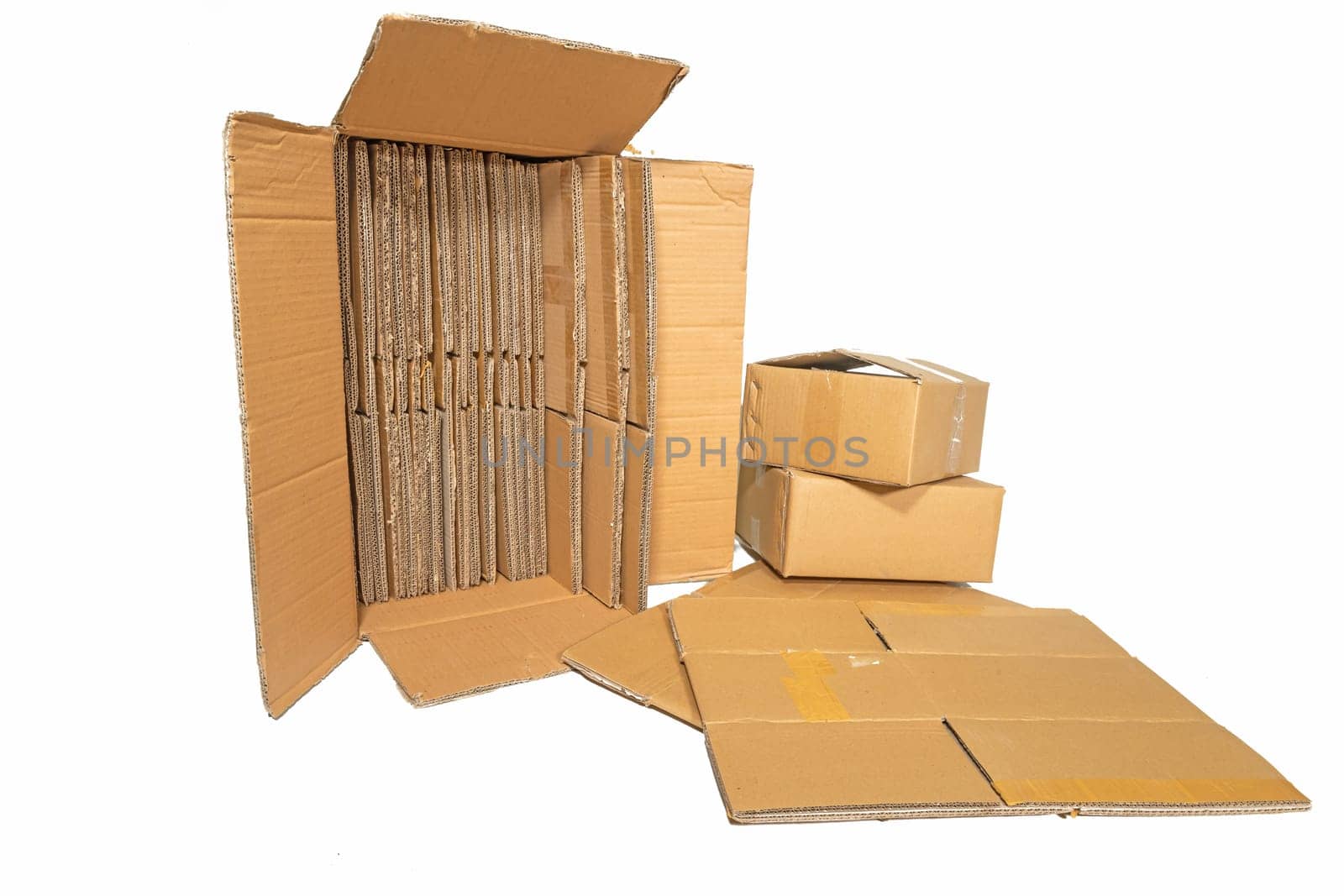 Several cardboard boxes of different sizes isolated on white