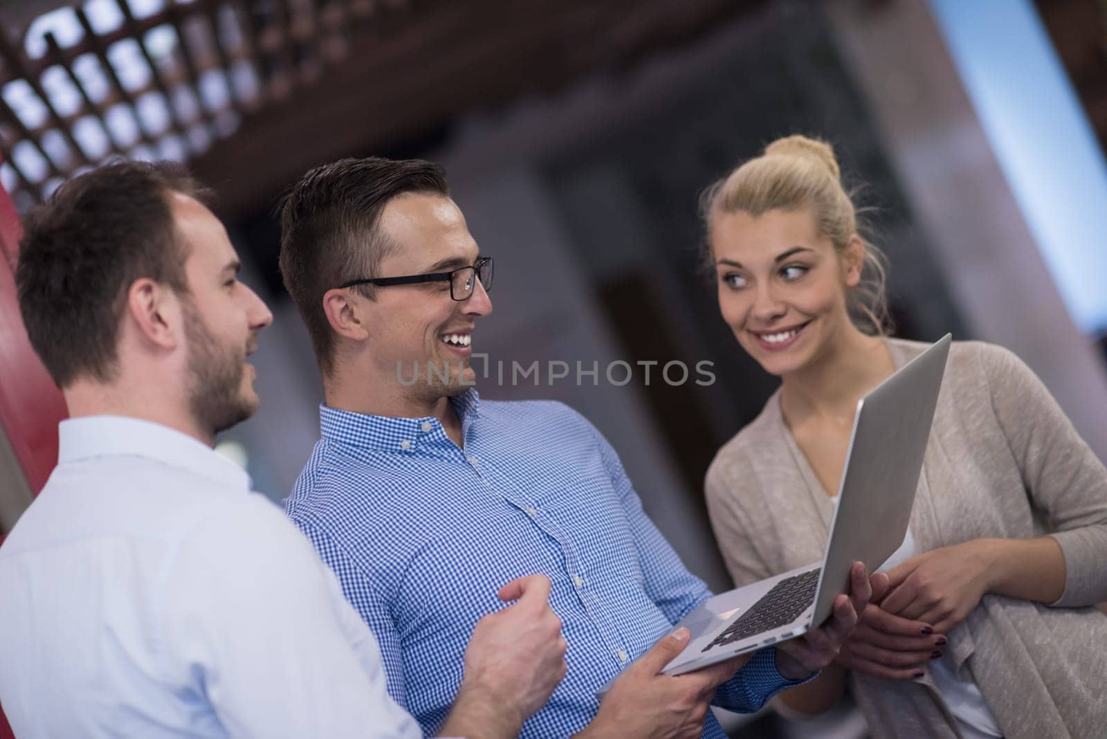 startup business people using laptop preparing for next meeting and discussing ideas in creative office