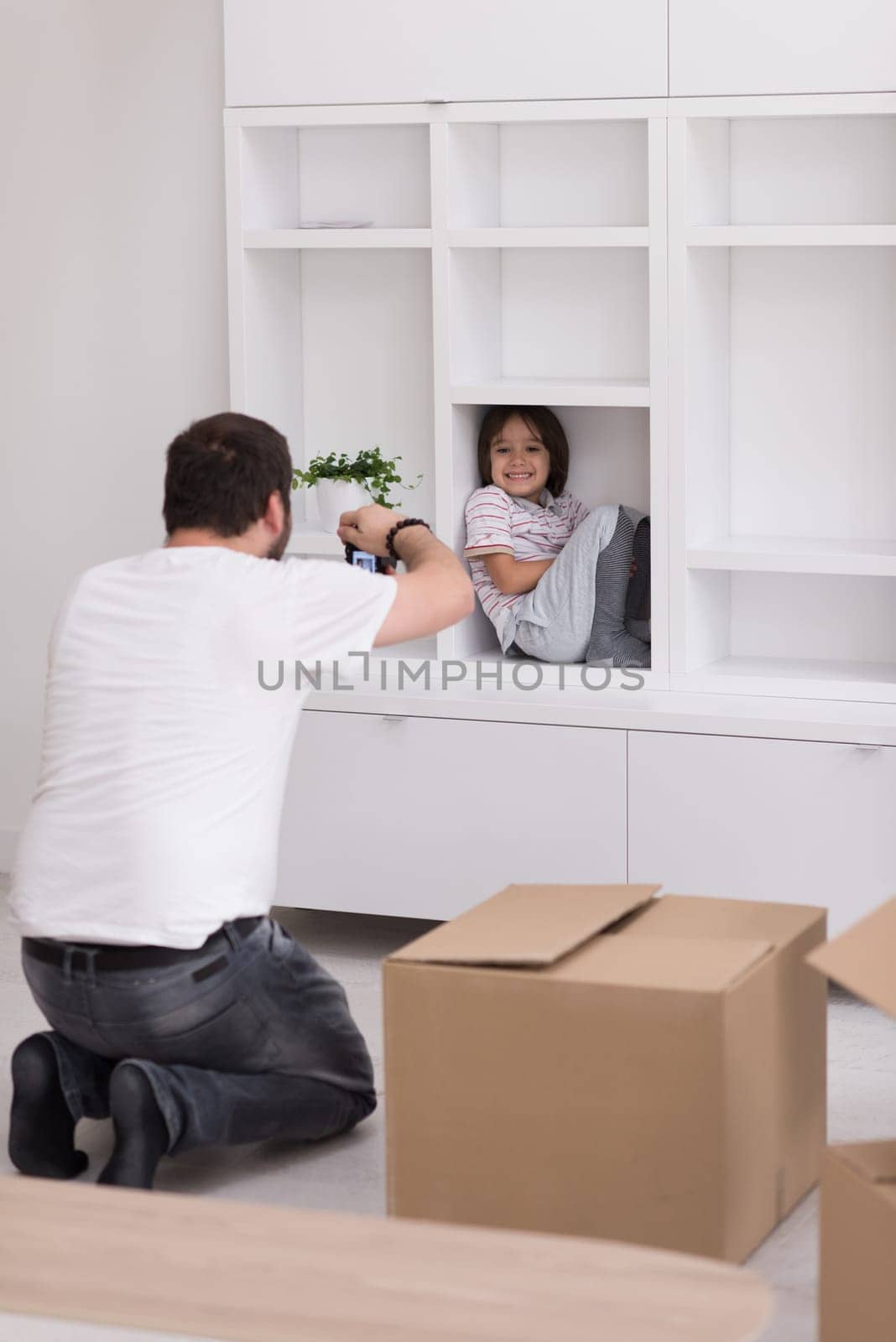 Photoshooting with kid model at studio as new modern home
